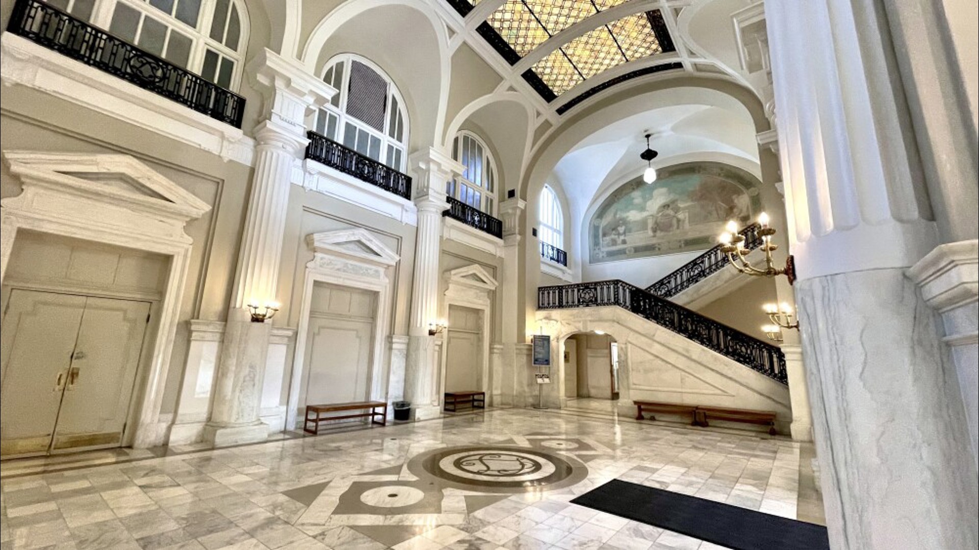 "Its inside is absolutely spectacular, boasting beautiful staircases with ornate railings and striking white marble columns and floors."