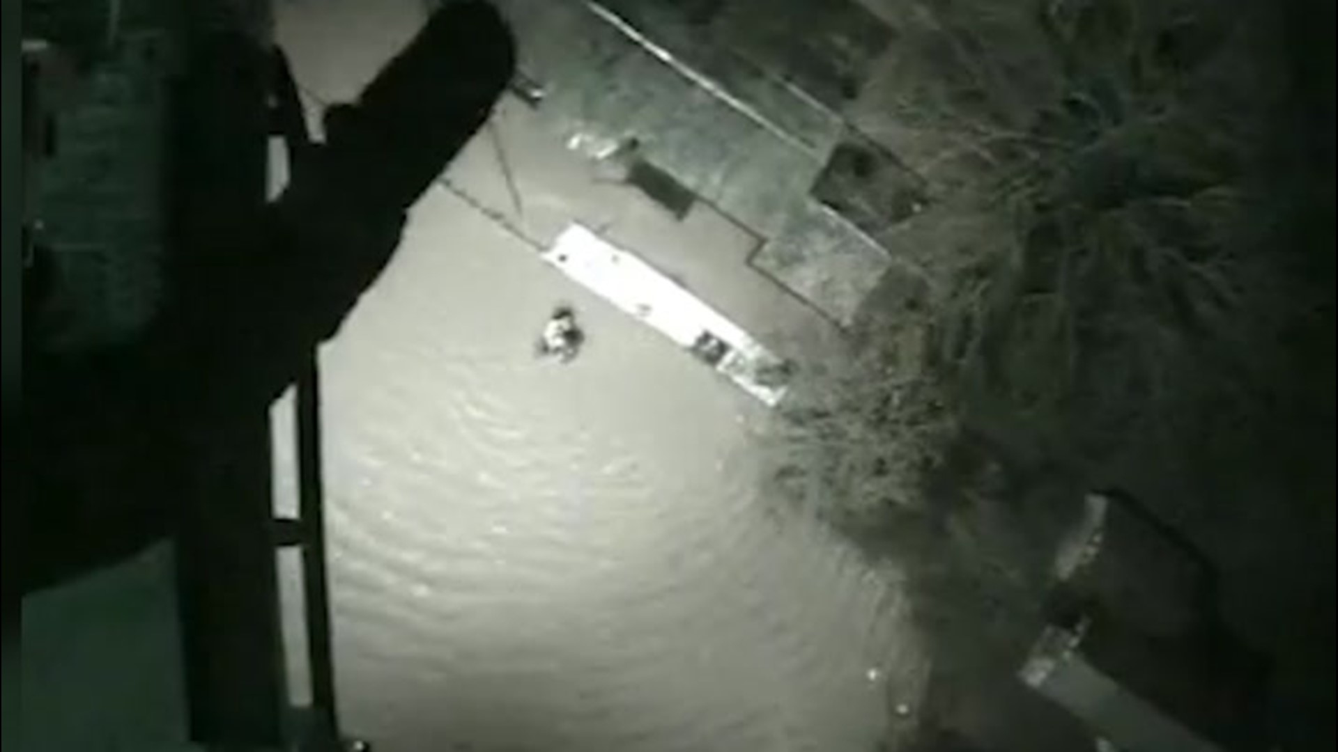 As floodwaters quickly rose in the Welsh town of Wrexham on Jan. 22, three people stranded on a ledge looked to the sky and found their way out.