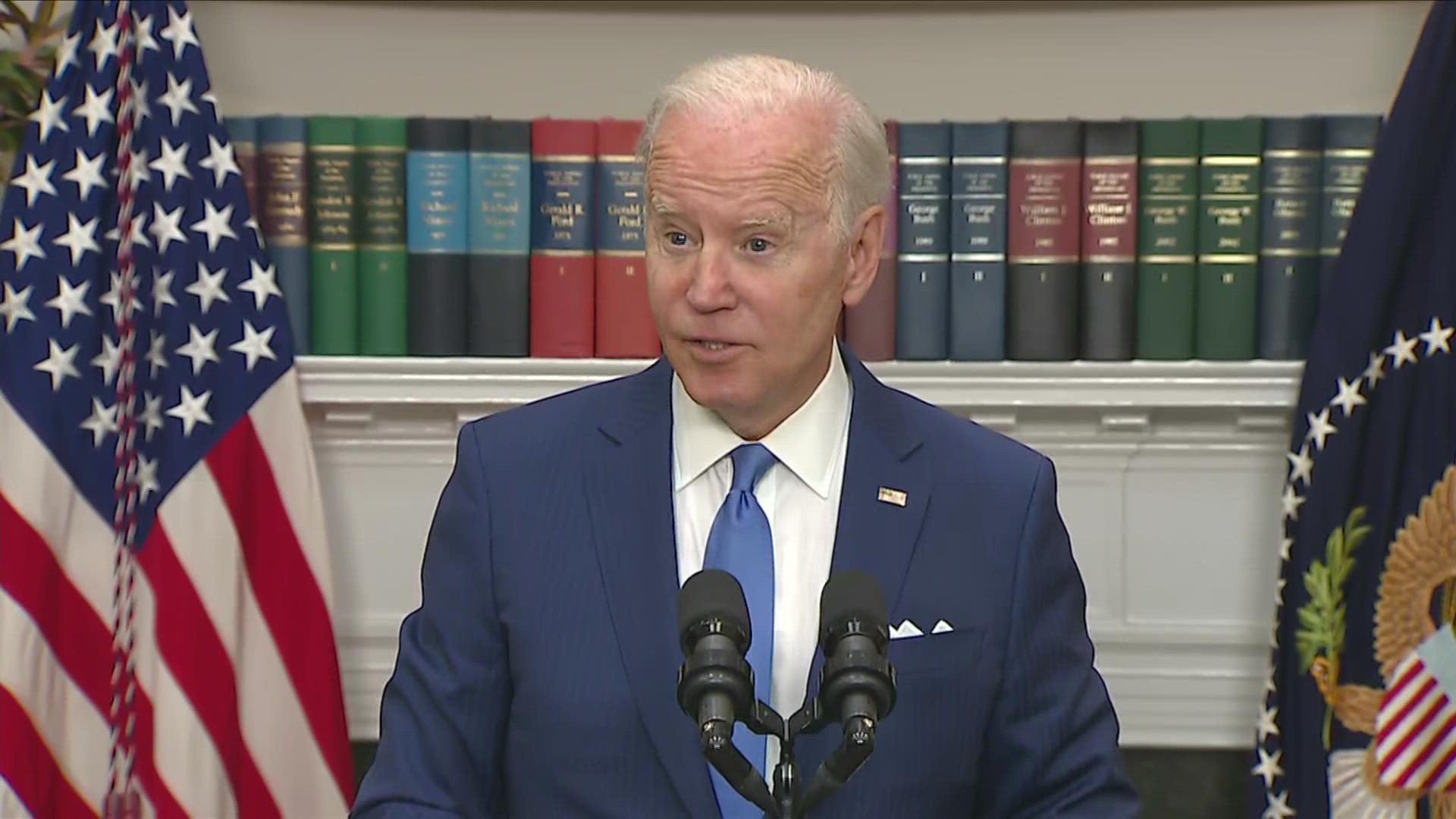 Biden said the $50,000 amount previously reported wasn't accurate, but said he was looking at debt forgiveness action for student loan borrowers.