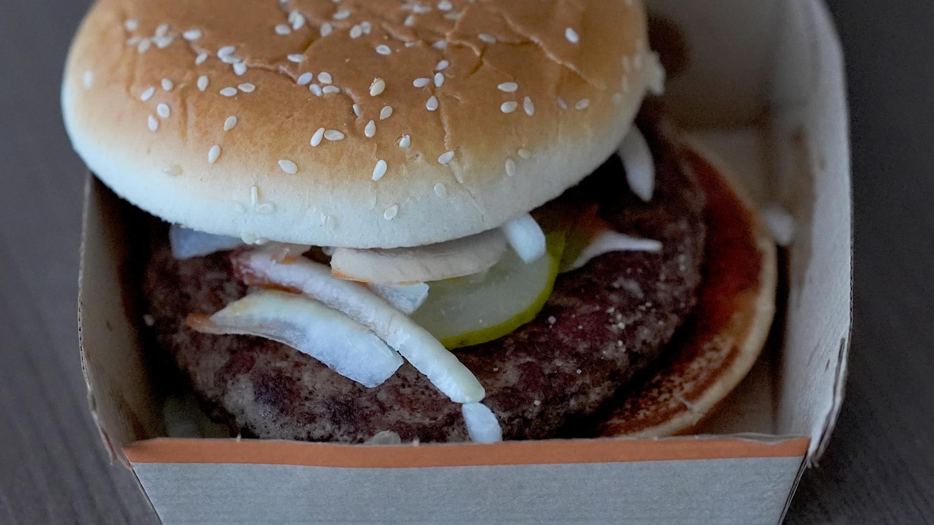 No source of the E. coli outbreak has been identified, but officials are focused on slivered onions used on the chain's Quarter Pounder burger.