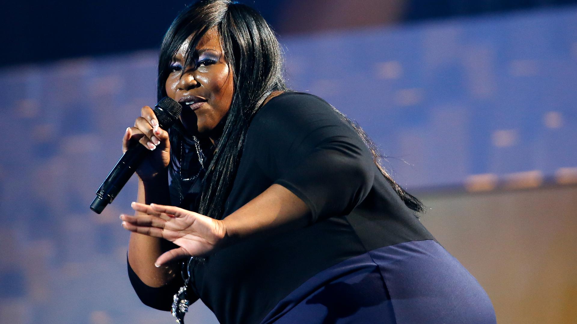 ​Mandisa became a fan favorite for her public kindness on "American Idol," responding with forgiveness to judge Simon Cowell's comments about her weight.