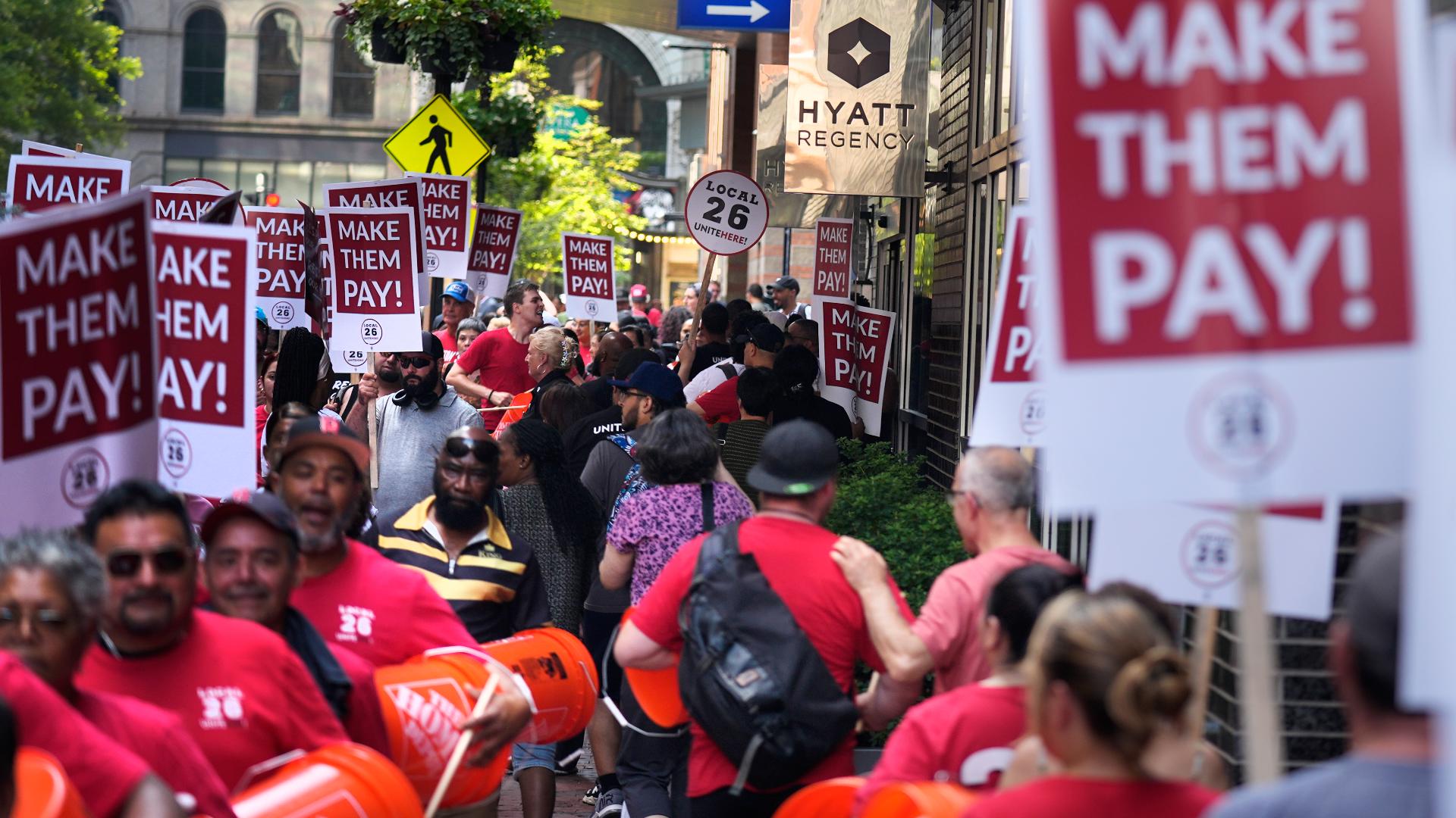 Workers are striking at Hyatt, Hilton, Marriott and Omni hotels.