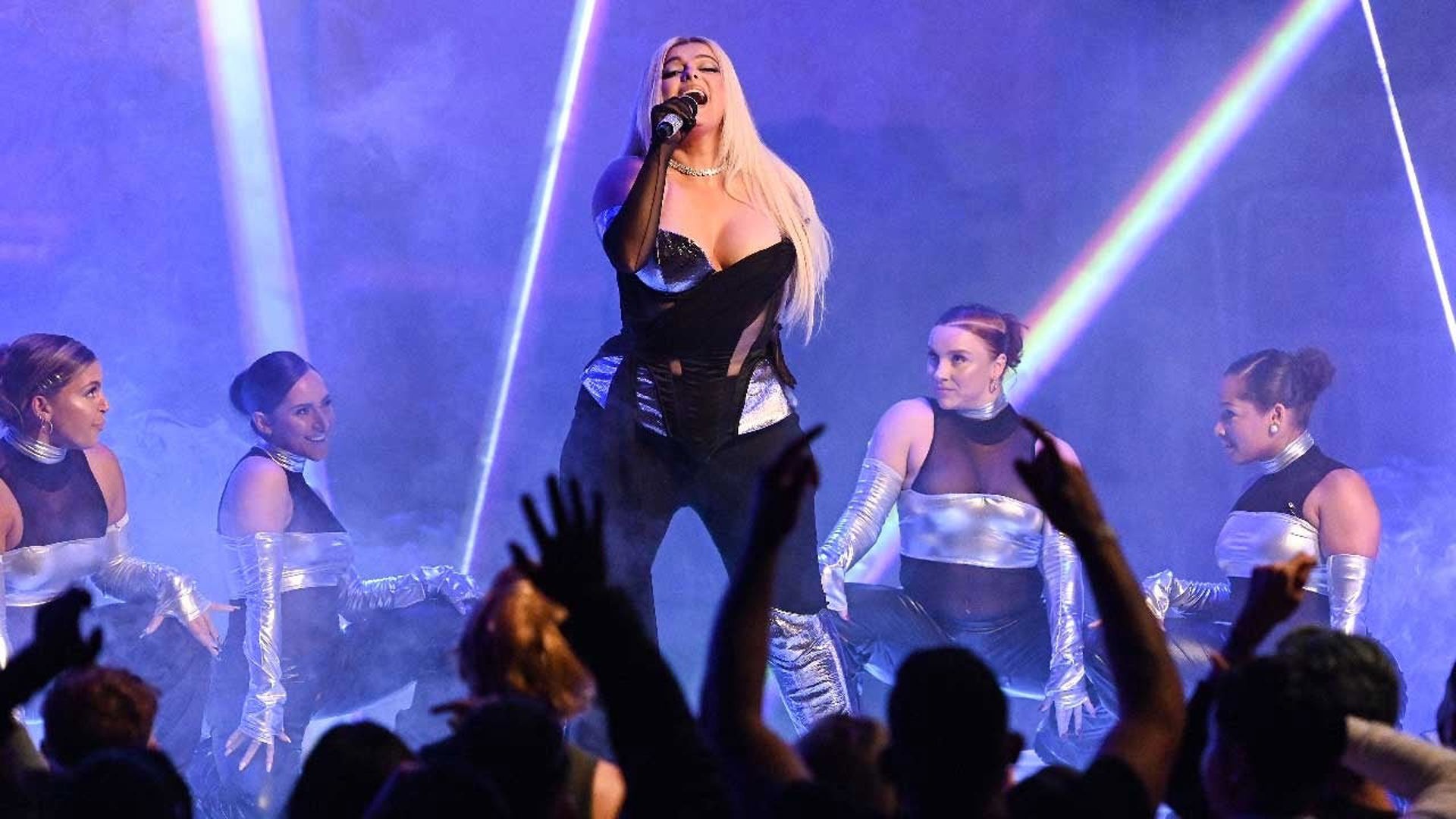 Bebe Rexha Threatens Legal Action After Concertgoer Tries to Throw(02)