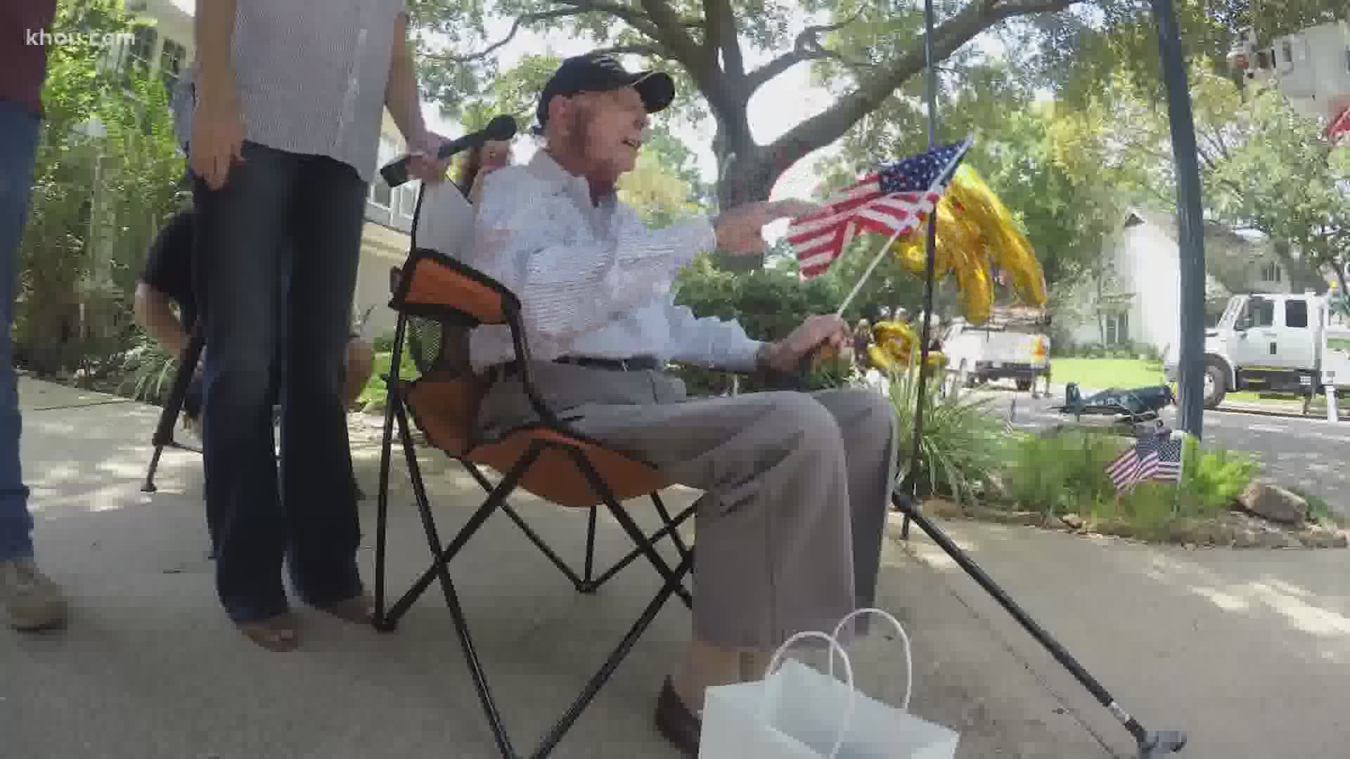 A Houston neighborhood surprised 99-year-old "Pappy" on his birthday with a car parade for the Marine.