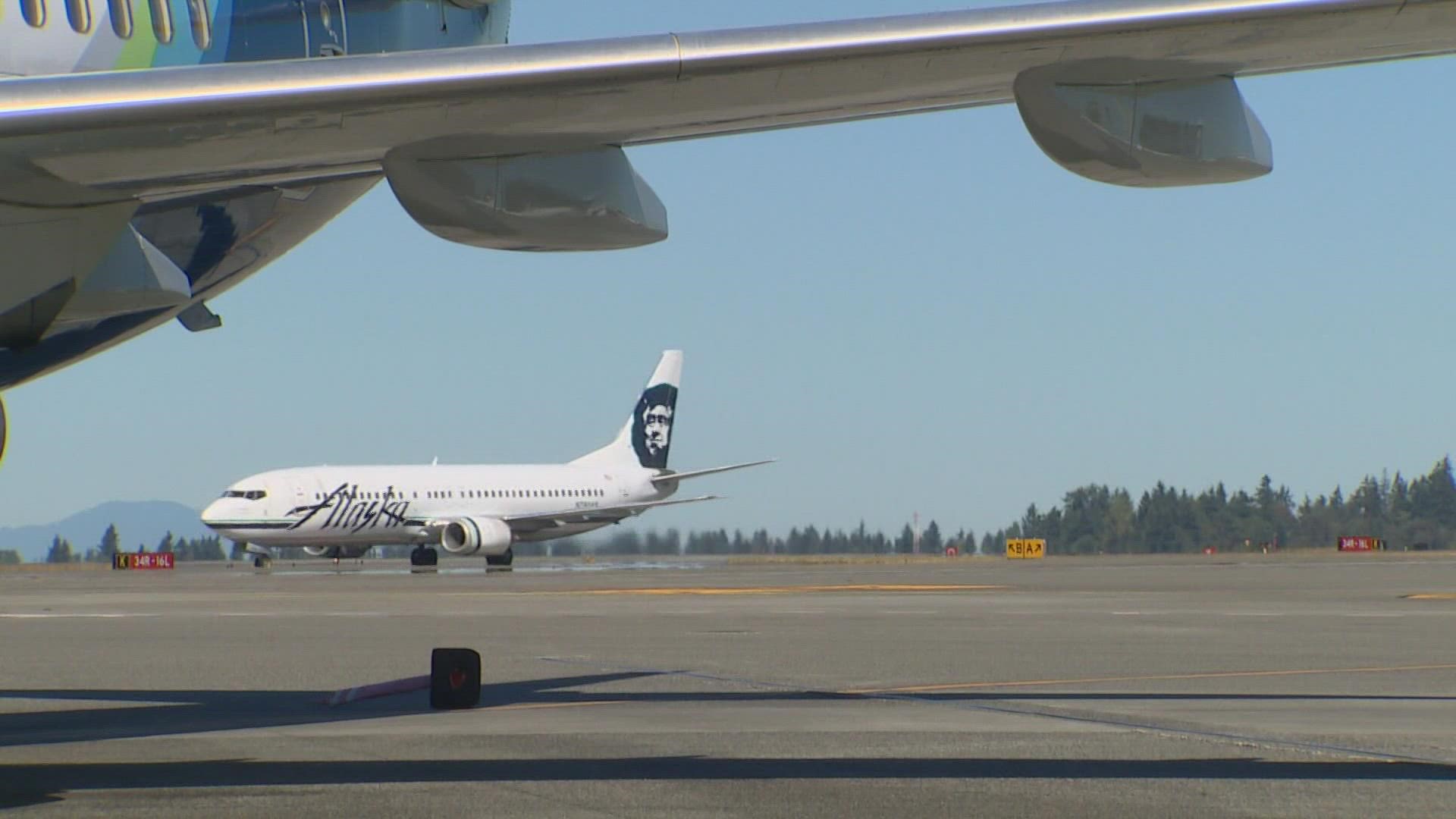Three airlines are requiring workers to be vaccinated or undergo regular testing. Alaska Airlines could join them.