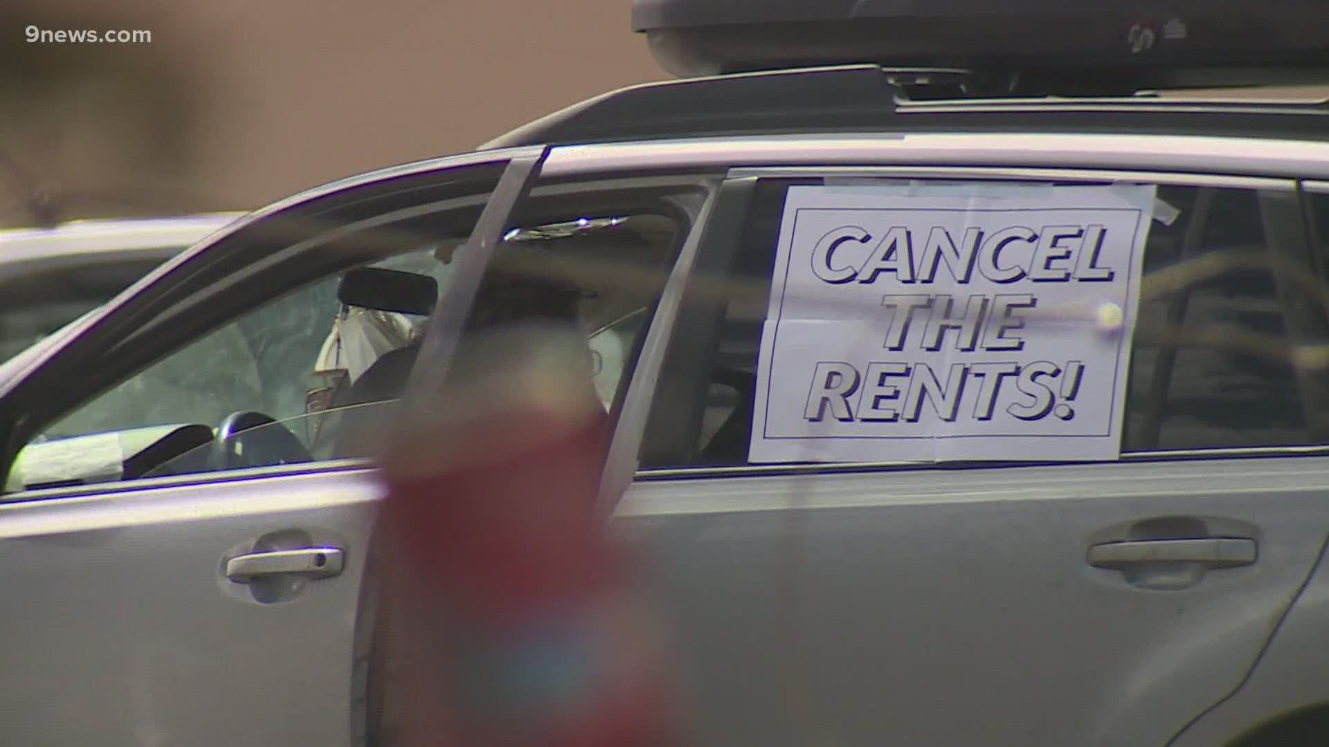 Dozens drive through Denver to ask for help with rent