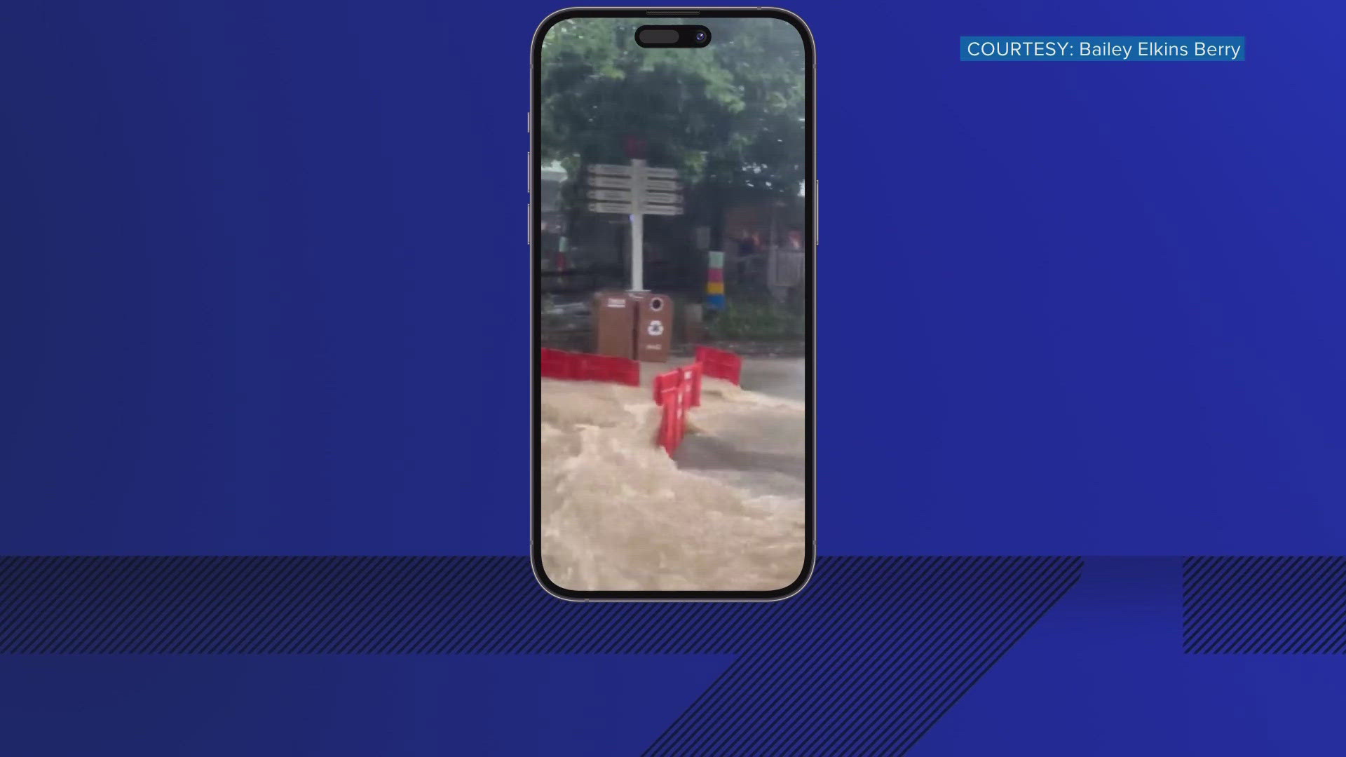 Multiple videos showed water quickly running down walkways at Dollywood, flooding inside stores and guests wading through knee-deep water in the parking lot.