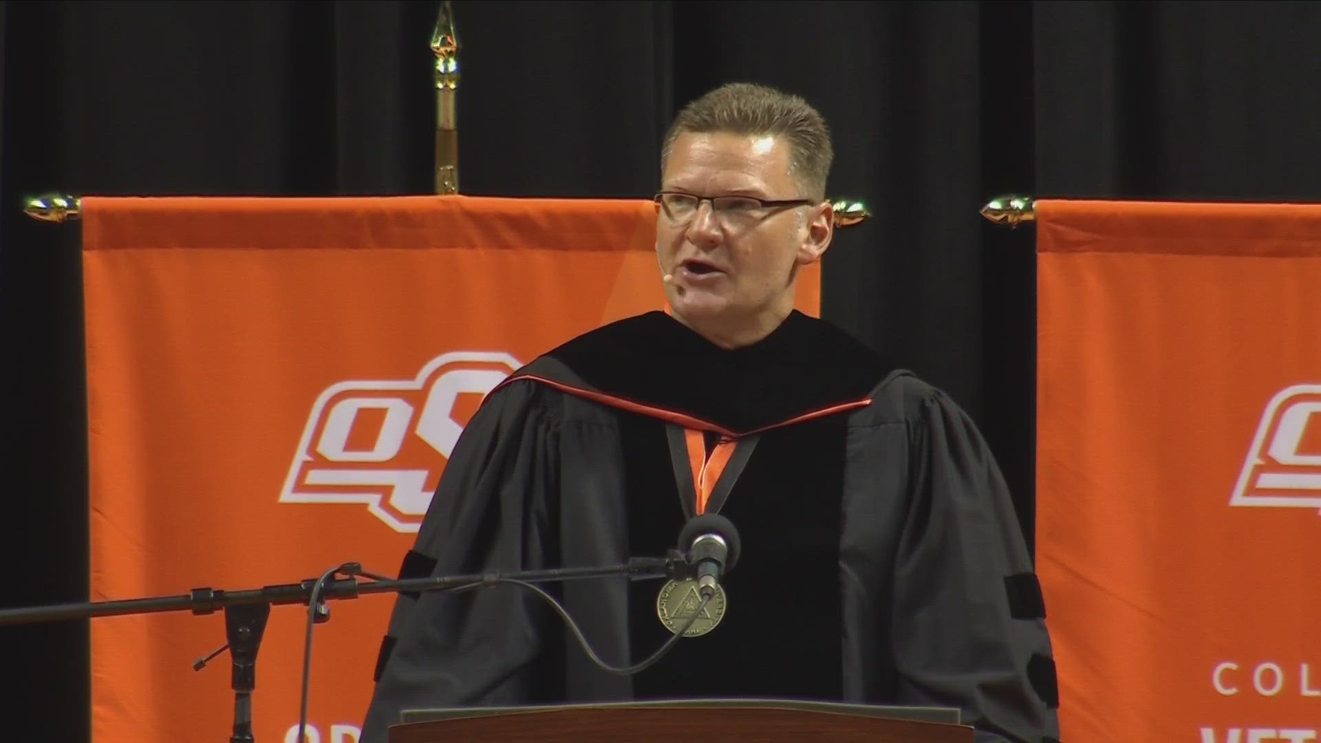 Bills assistant athletic trainer Denny Kellington returned to his alma mater, Oklahoma State University, to speak during the spring commencement ceremonies.