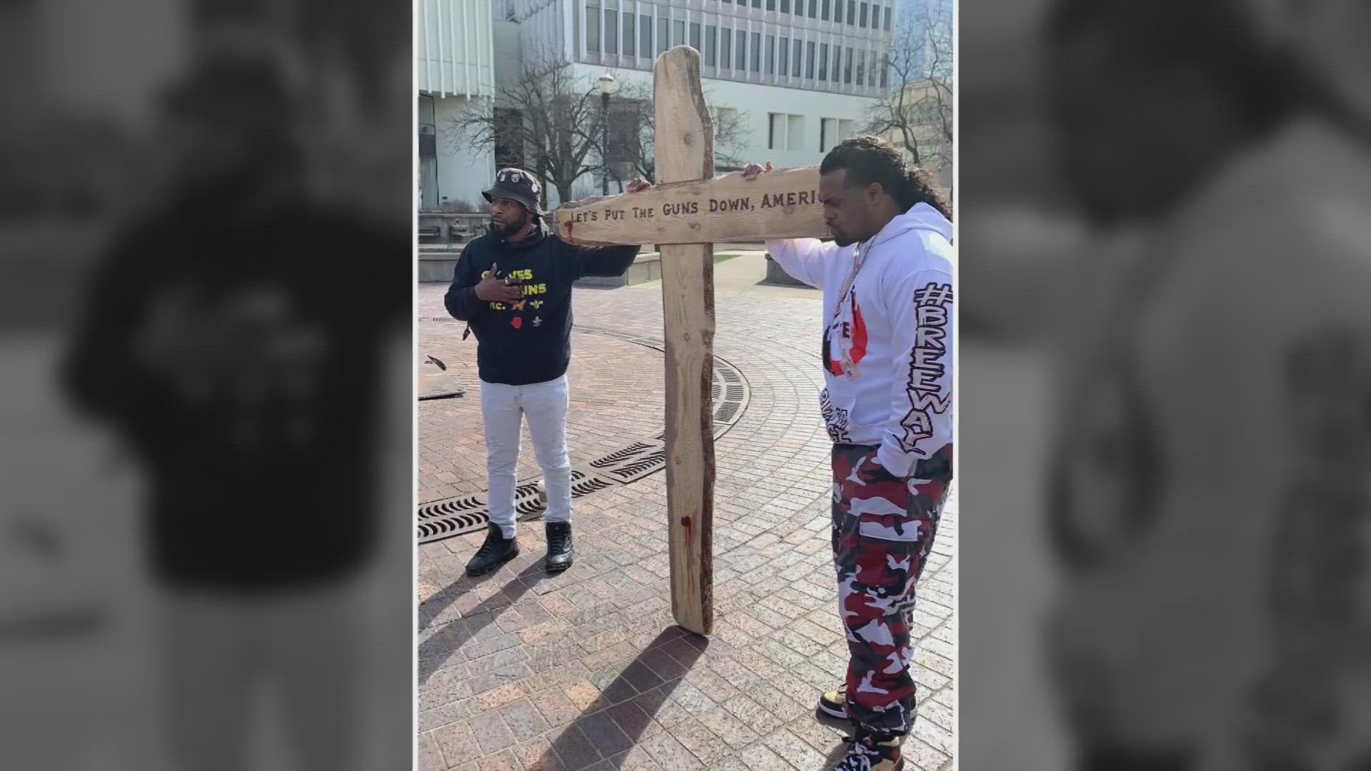 Dee Garrett will carry a 10-foot wooden cross as he walks from Louisville to Frankfort. He's hoping the walk will ignite change in the community.