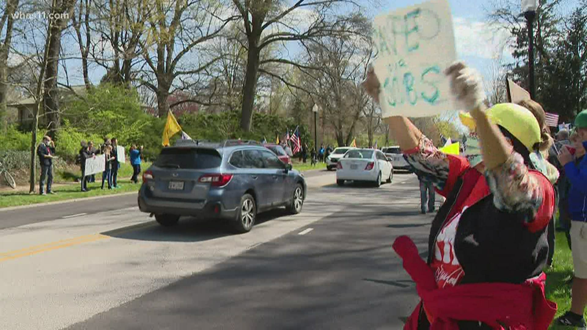 Protesters stood in front of the Indiana governor's mansion demanding the state be reopened even though COVID-19 cases and deaths are on the rise.