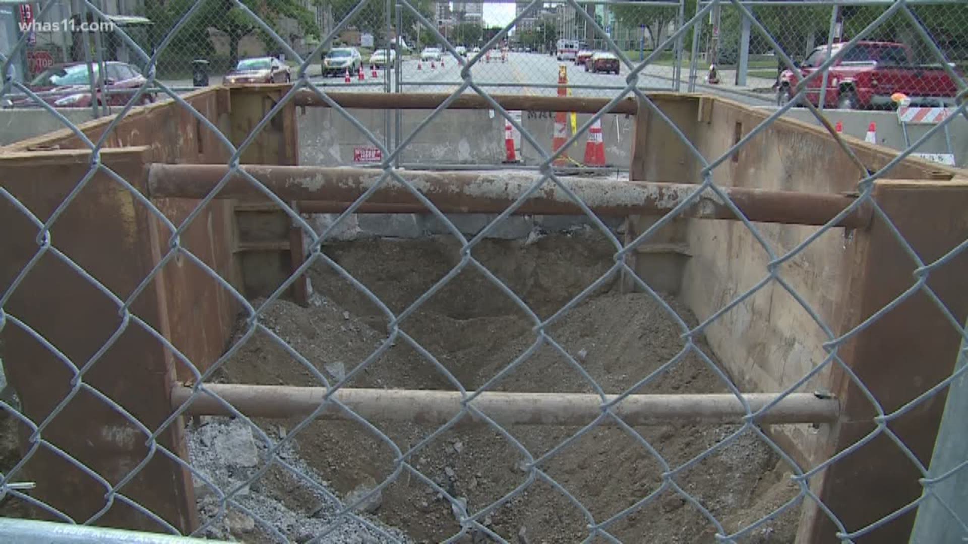 Sewer cave-in causes closures on E. Broadway