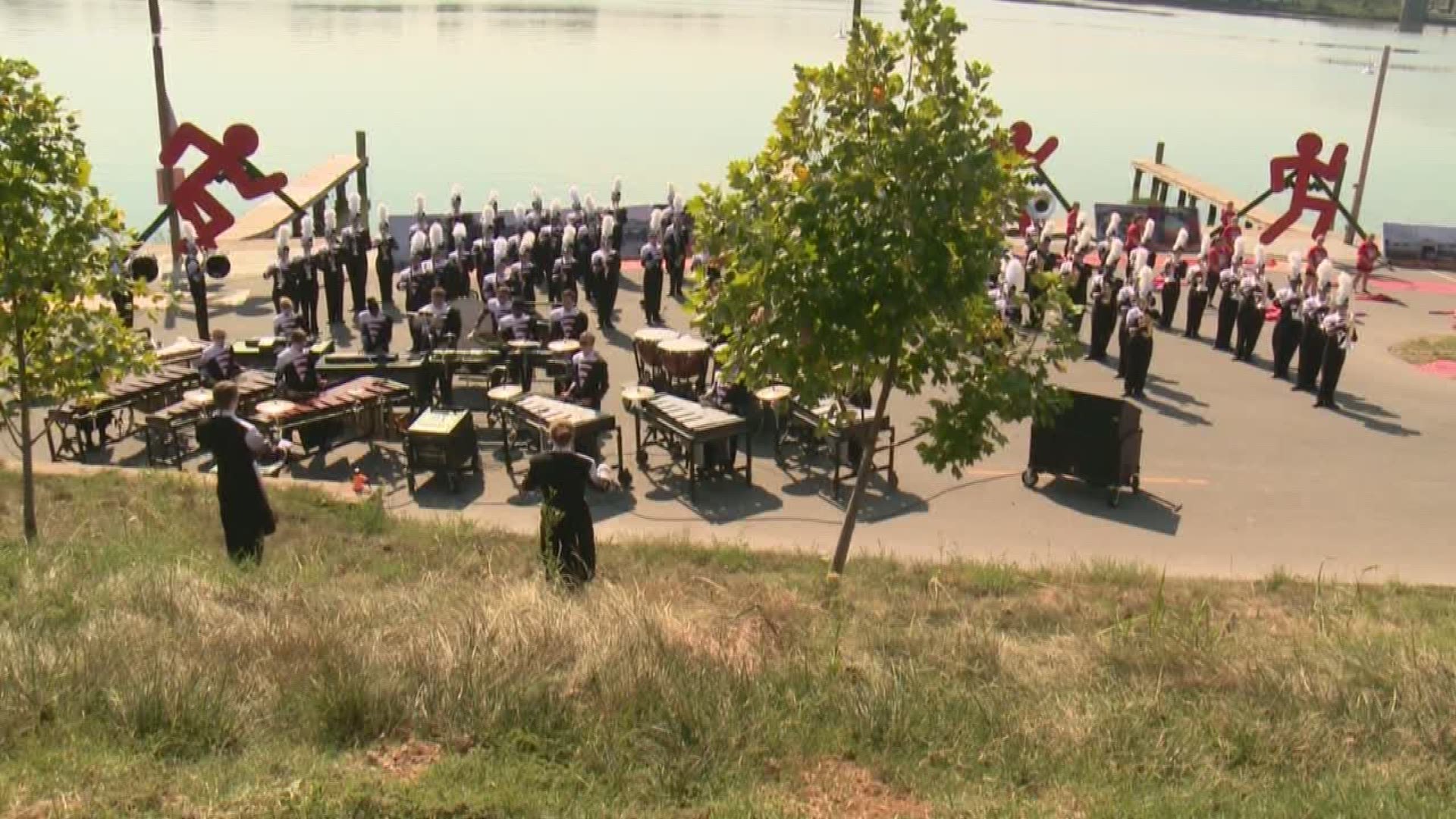 City celebrates marching band's 90th anniversary by commissioning composer to write hymn.
