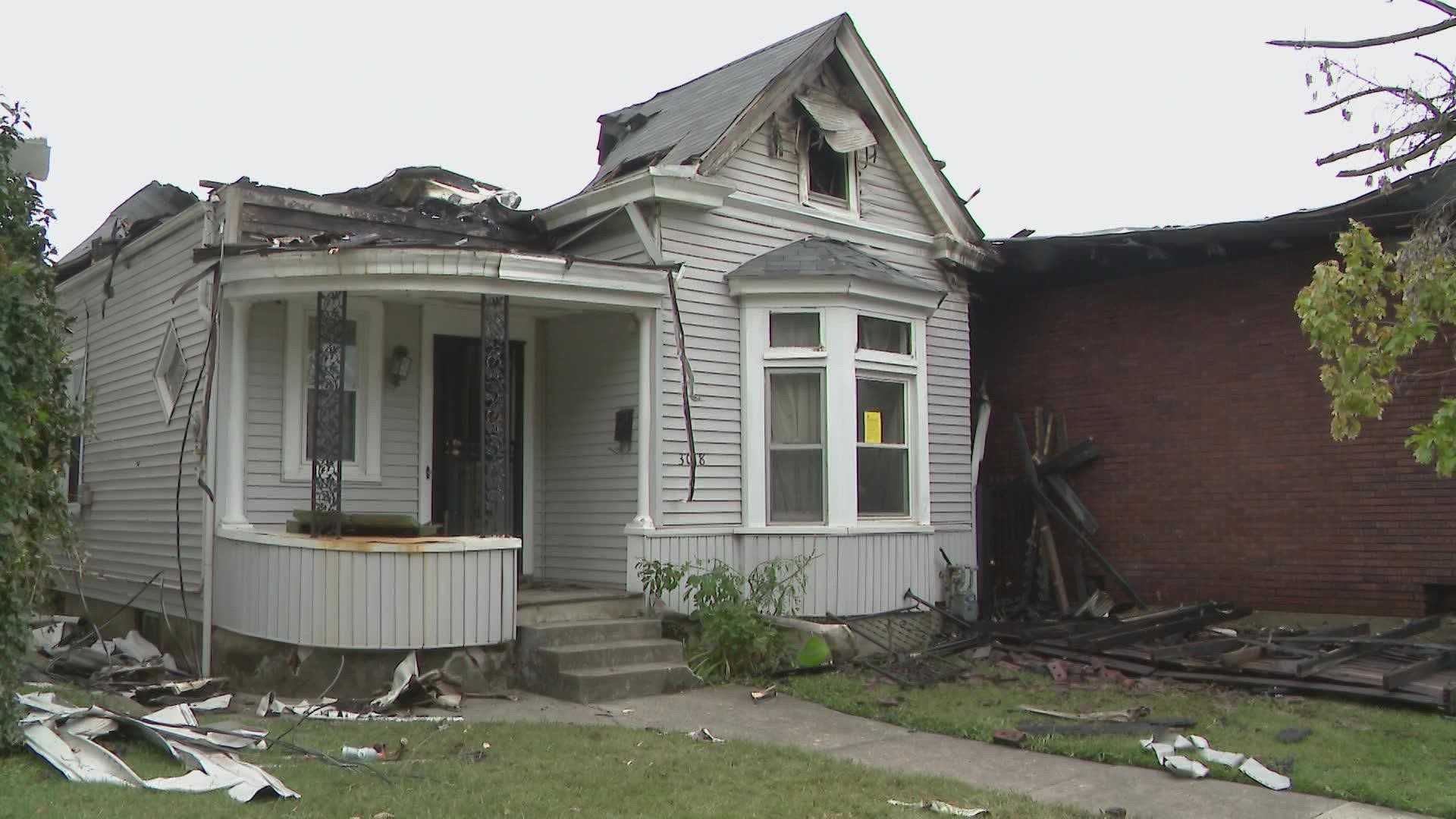 A teenager has been arrested for allegedly setting a warehouse on fire which injured firefighters and displaced residents in the Russell neighborhood.