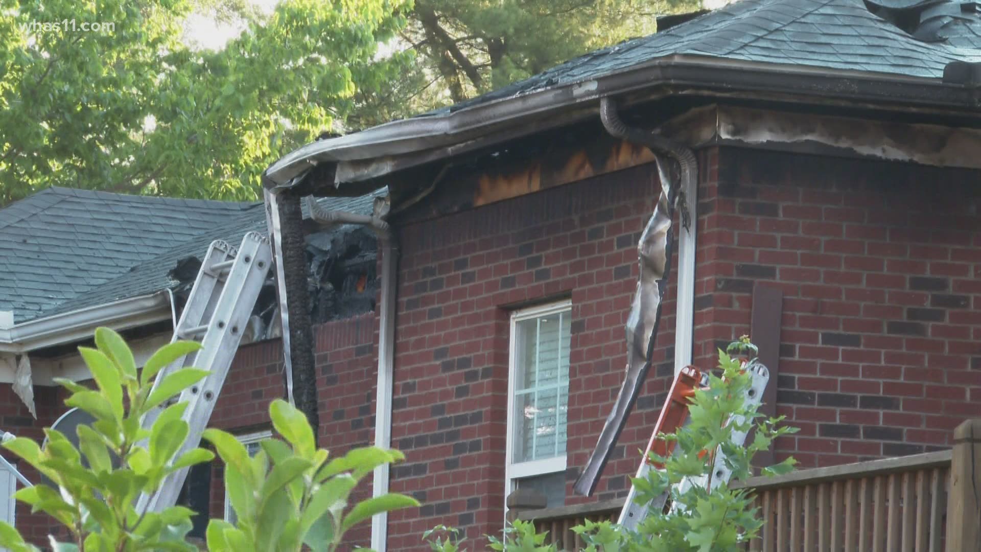 A Lyft driver thought she was doing a routine pick-up at an apartment complex but instead jumped into action after finding part of the building on fire.