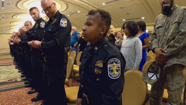 LMPD swears in 11-year-old as honorary chief during recruits' graduation ceremony