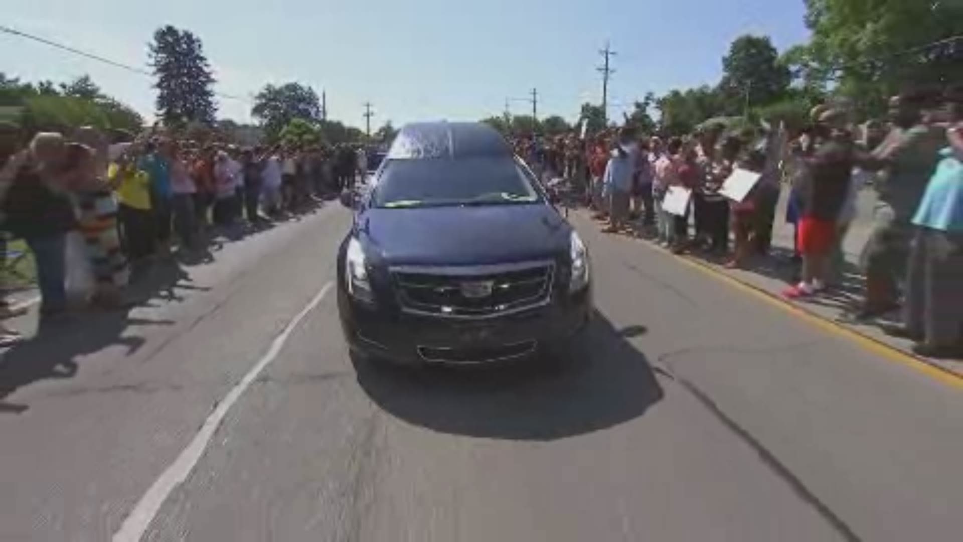The people waiting outside the funeral home in Louisville chanted for Muhammad Ali as the procession got underway.