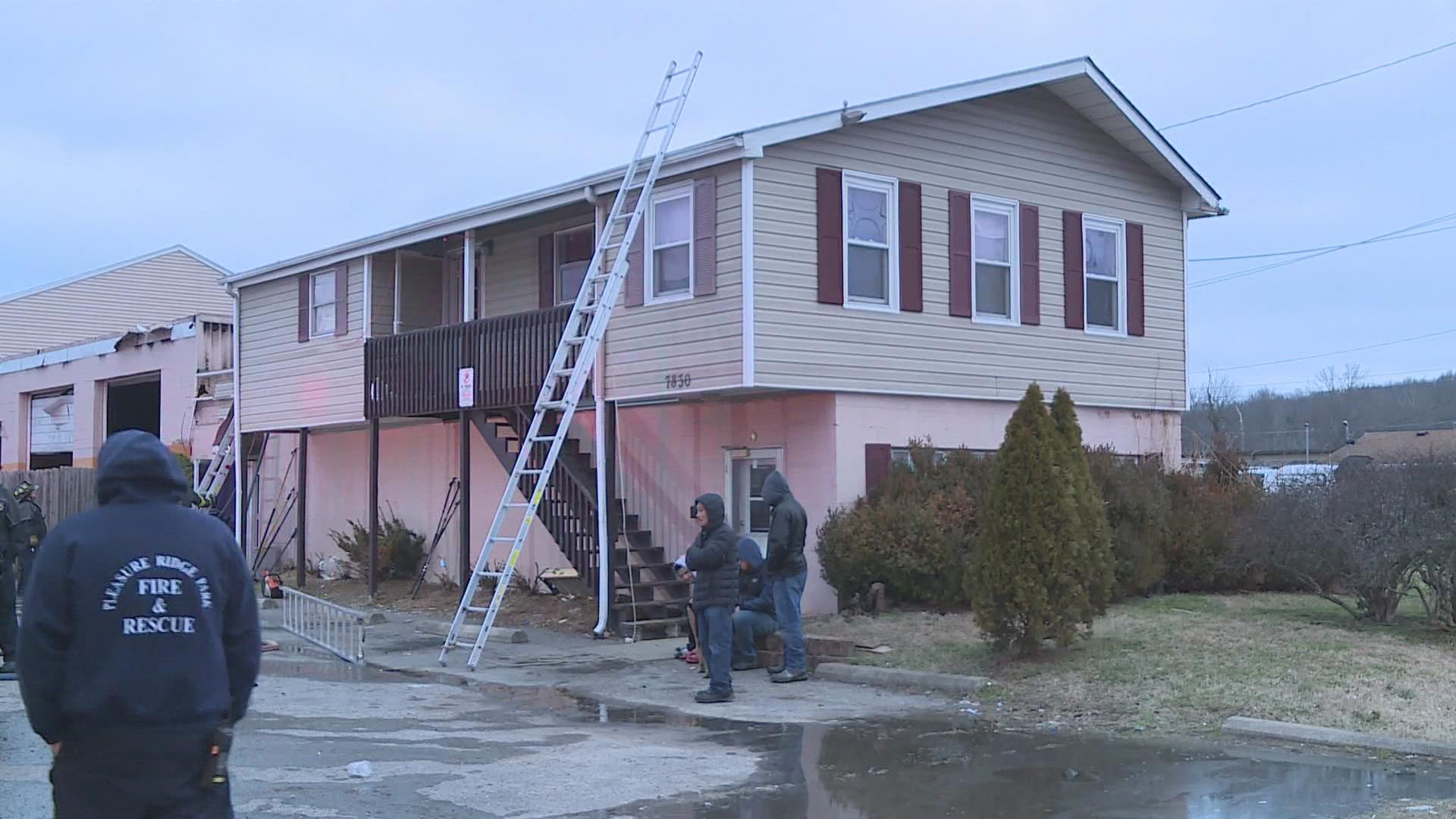 The shop was connected to an apartment complex. Firefighters stopped the fire before it could spread to the apartments.