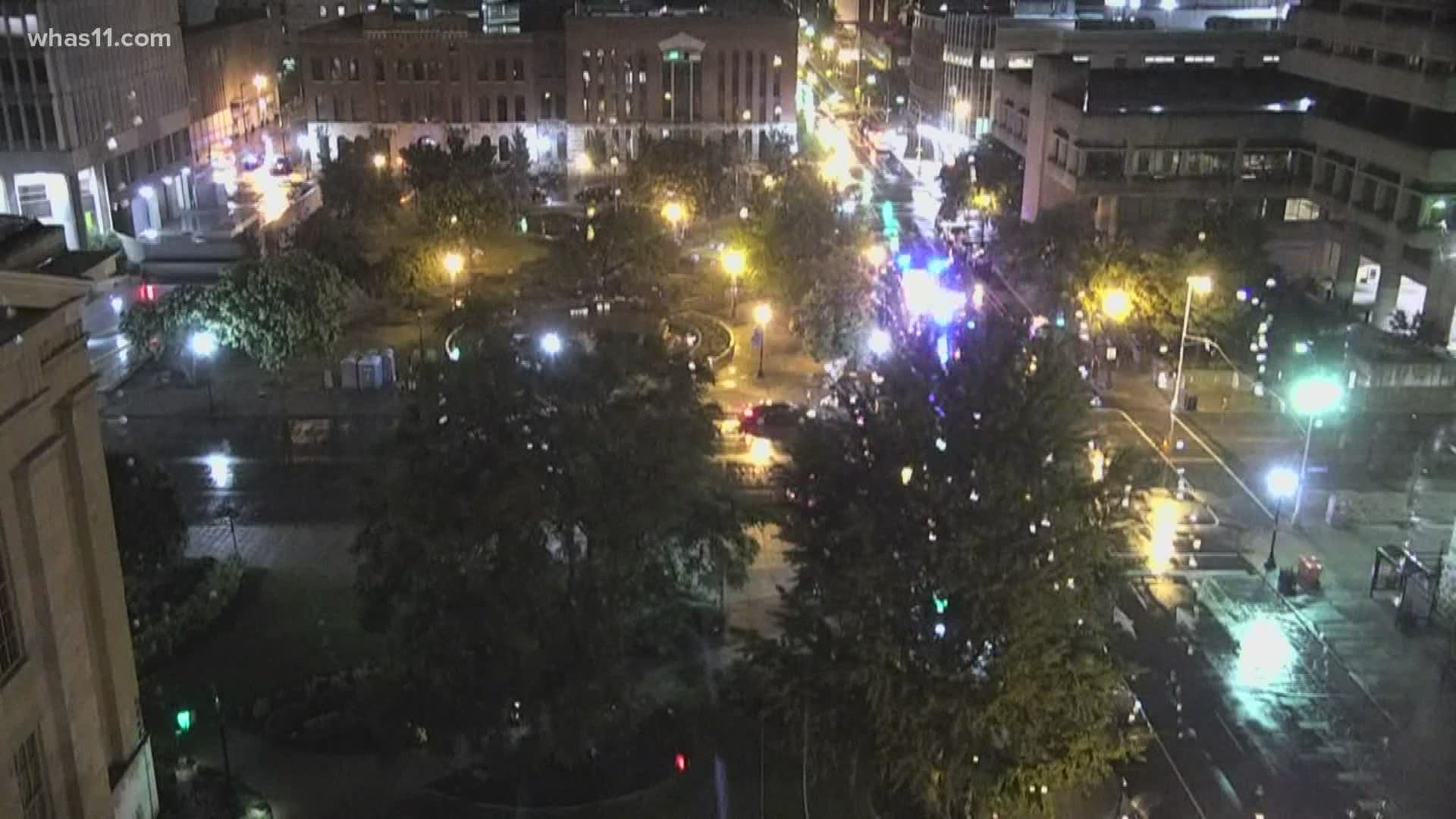 In a statement Thursday, LMPD said upon further review the SWAT car hit a protester's car that was attempting to leave the area.