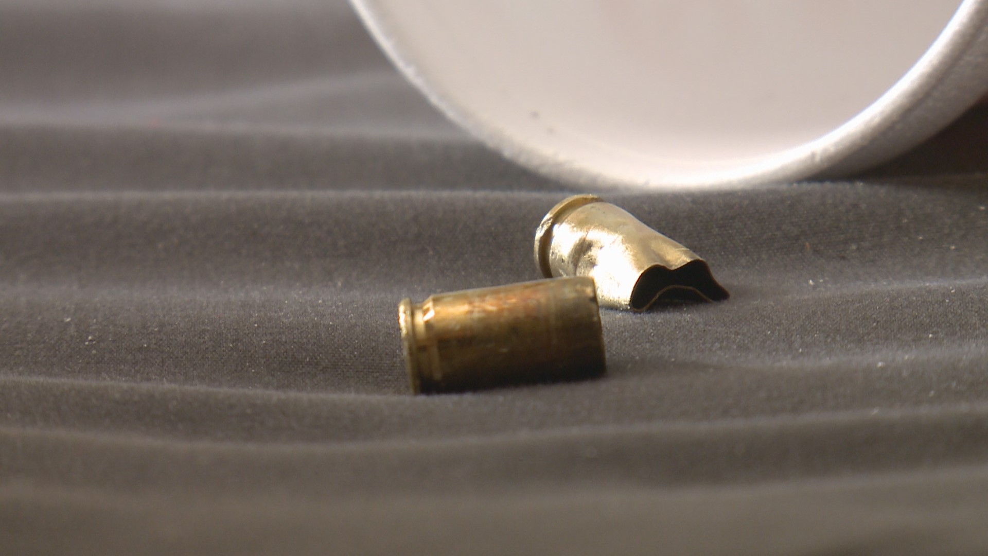 Louisville grandma said she was sleeping in her home when bullets started to fly outside and one landed on her pillowcase as she was sleeping.