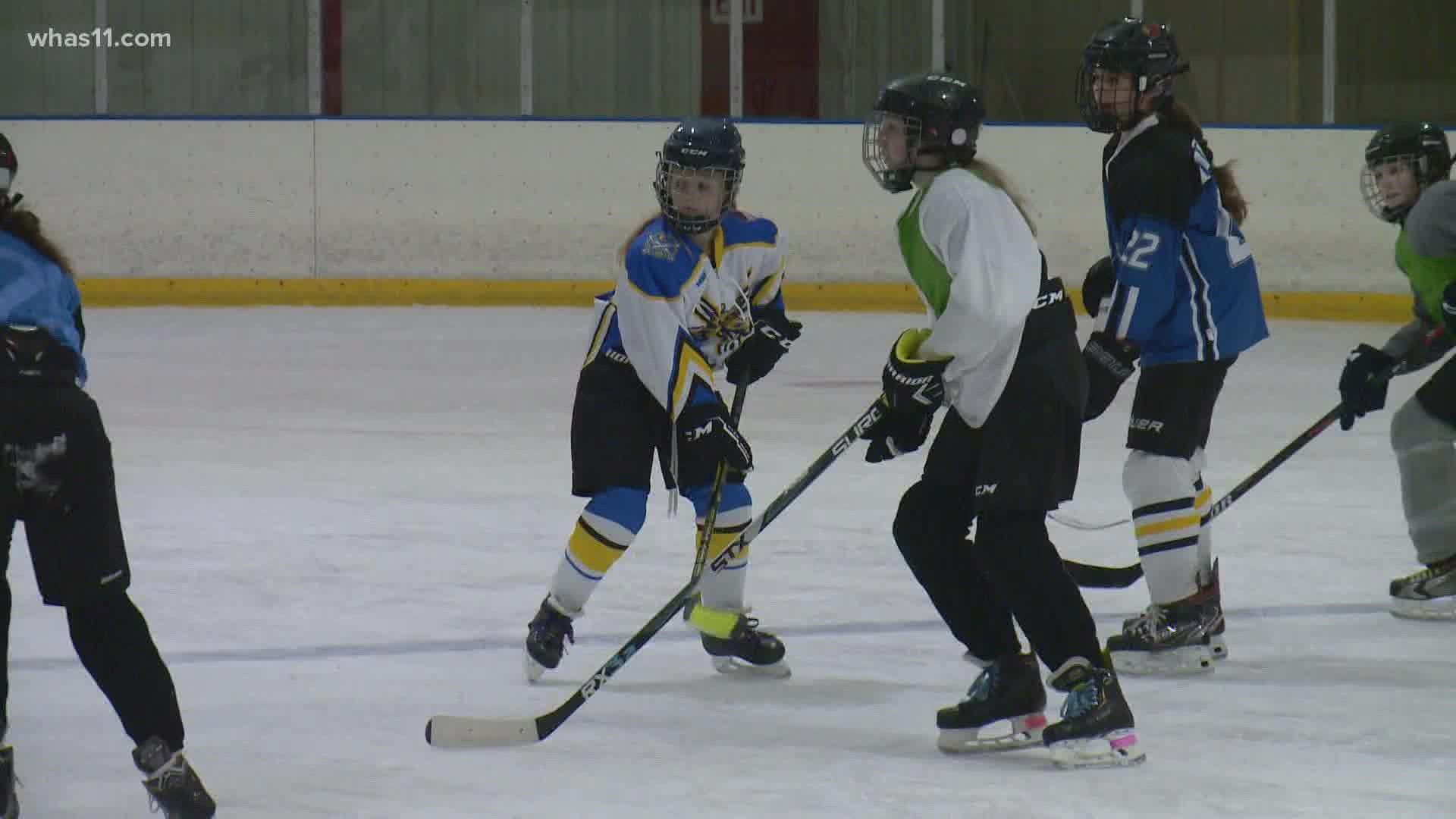 The coach said her focus is sharing the girls' love for the sport and getting more young women on the ice.