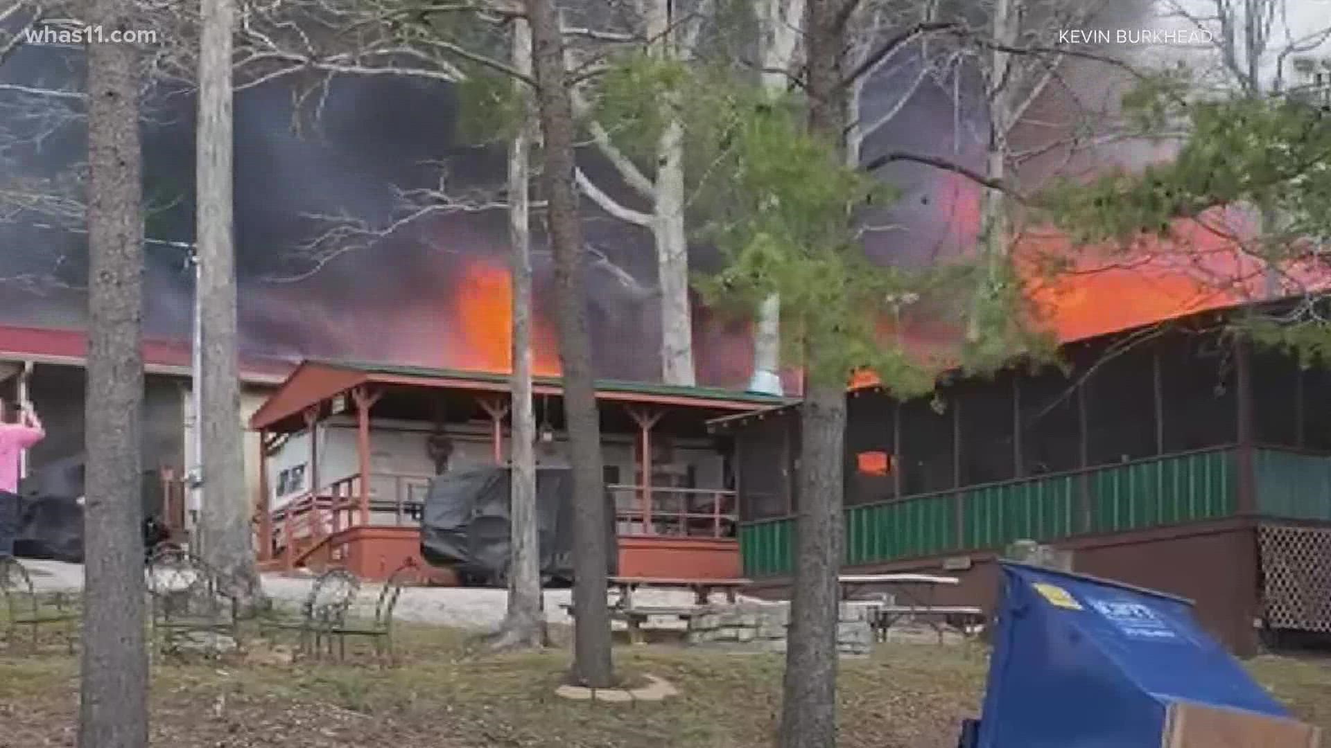 The fire at Nolin Lake destroyed at least seven cottages according to eyewitness Kevin Burkhead.
