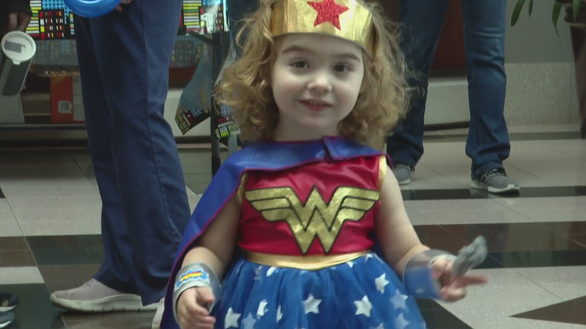 Kids who received around the clock care returned to visit the doctors and nurses, even dressing up as "all-star heroes".