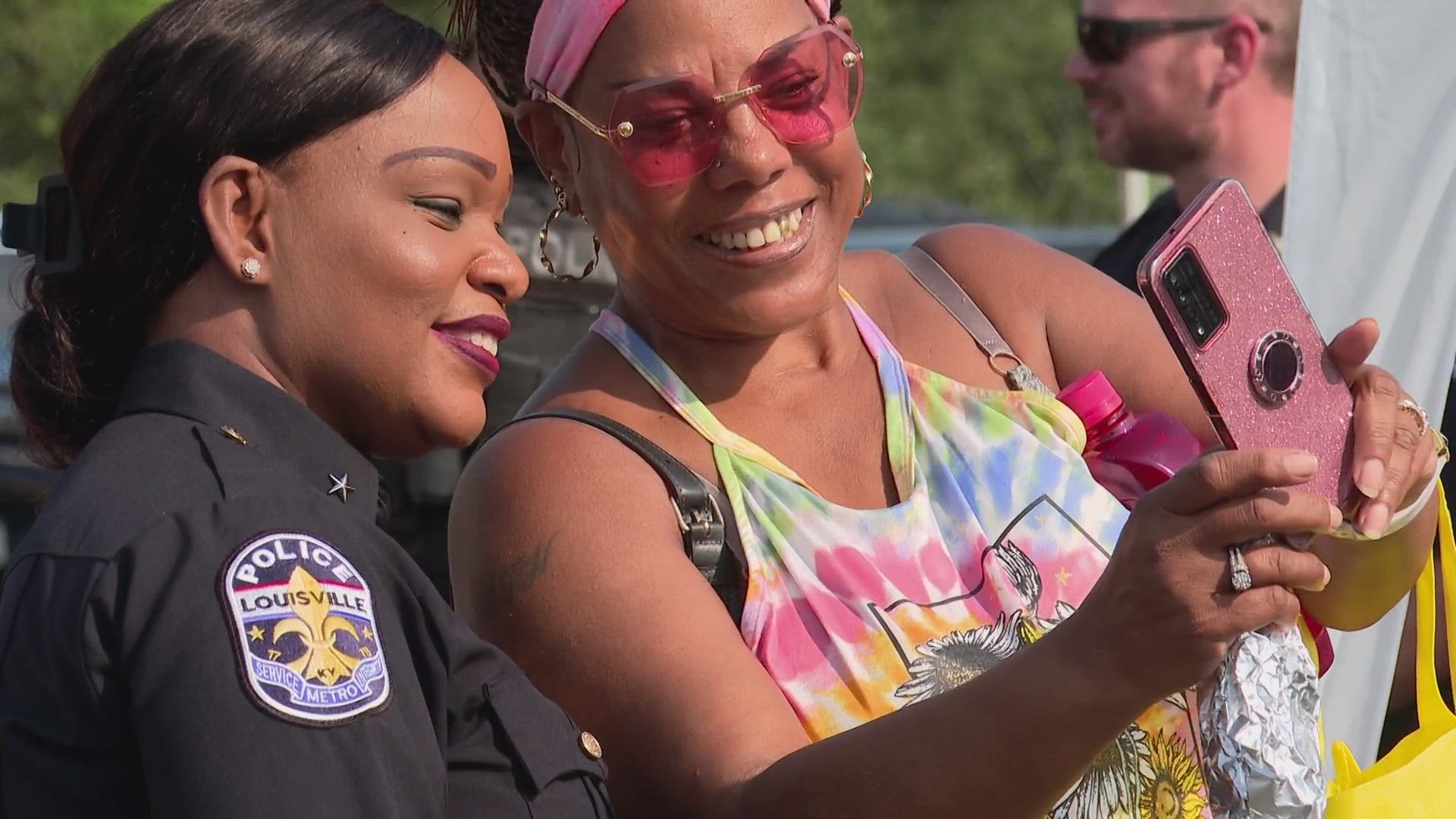 Louisville police officers and community members came together to discuss neighborhood happenings while fostering relationships during the annual National Night Out.