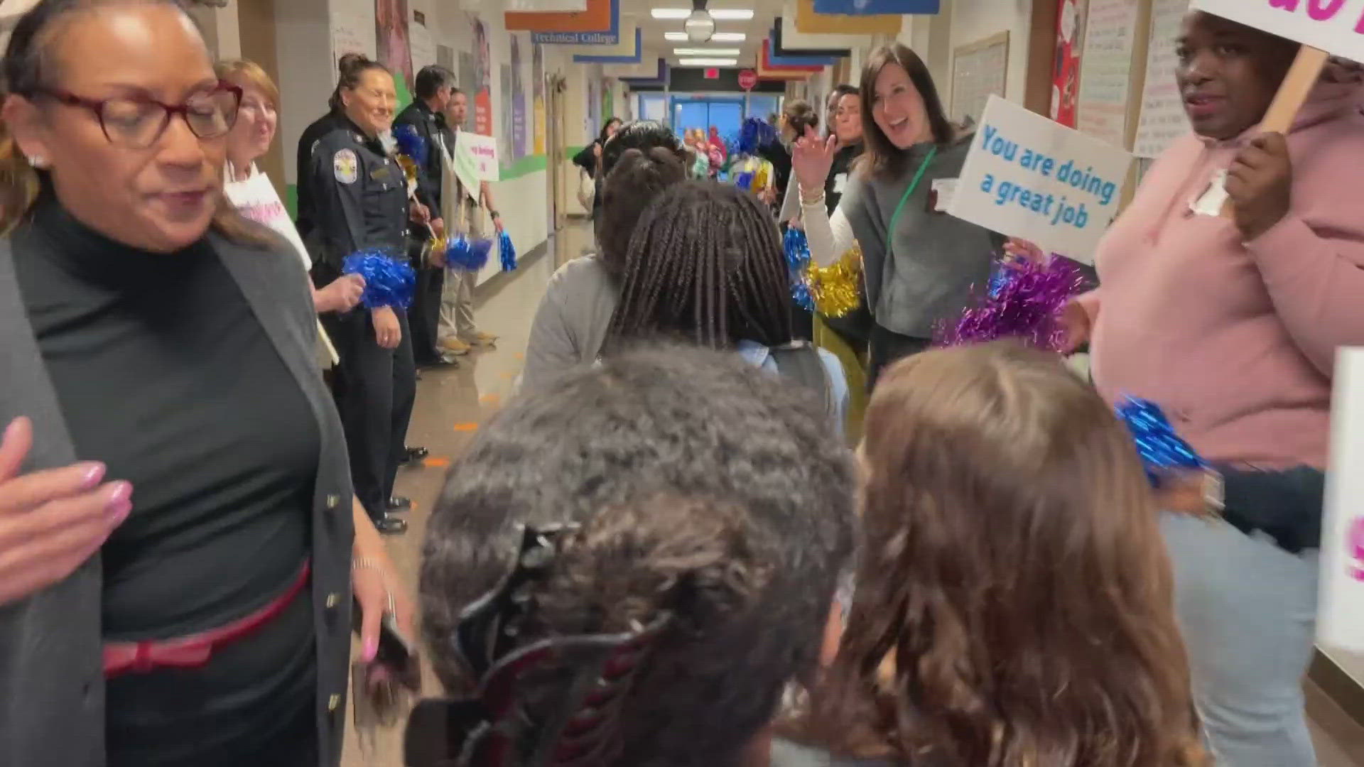 Louisville moms were up and ready Thursday morning to help get local students excited about their school day.