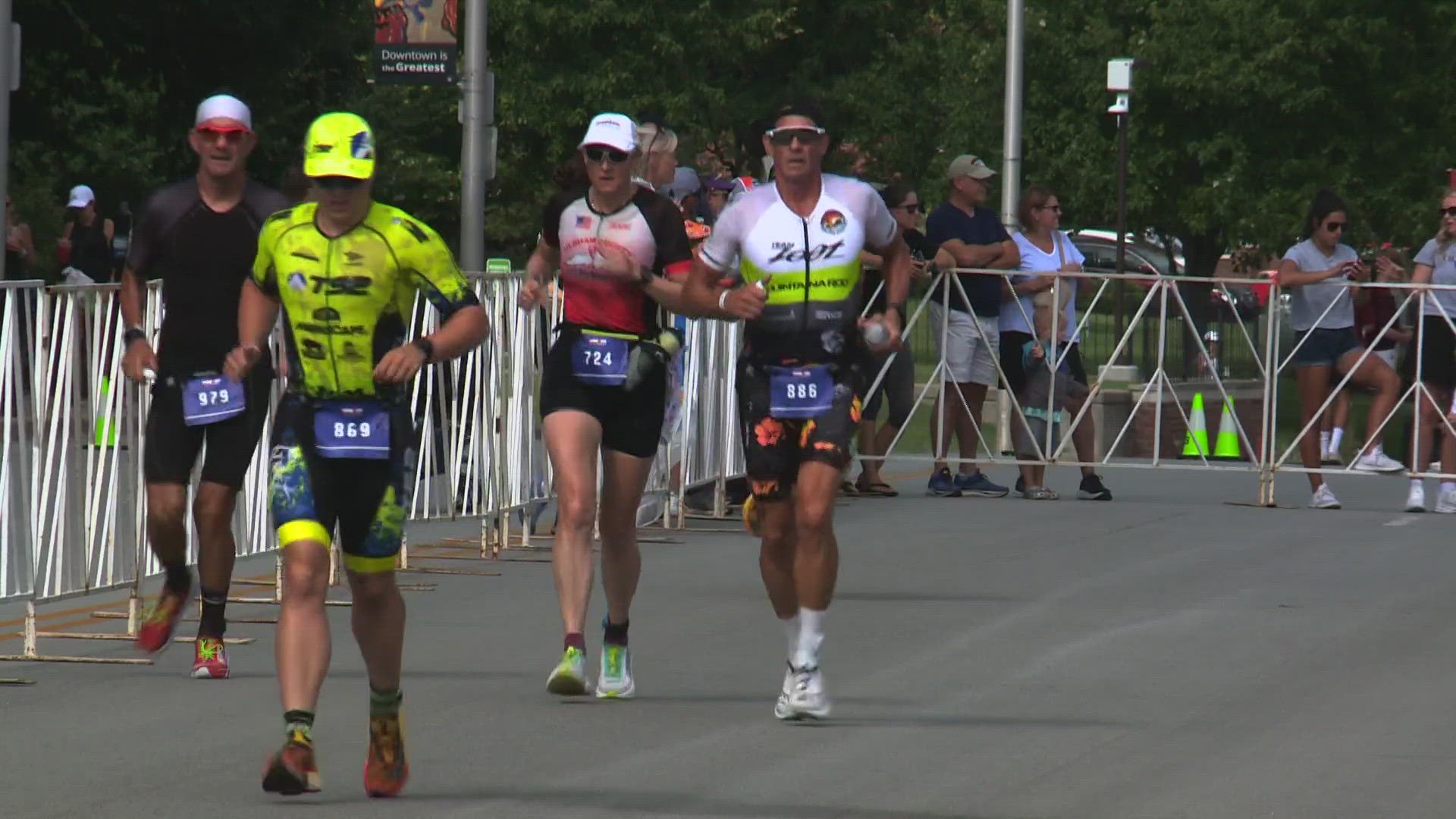 Athletes swam in the Ohio River, cycled through Oldham County and ran along the waterfront that ended at Fourth Street Live.