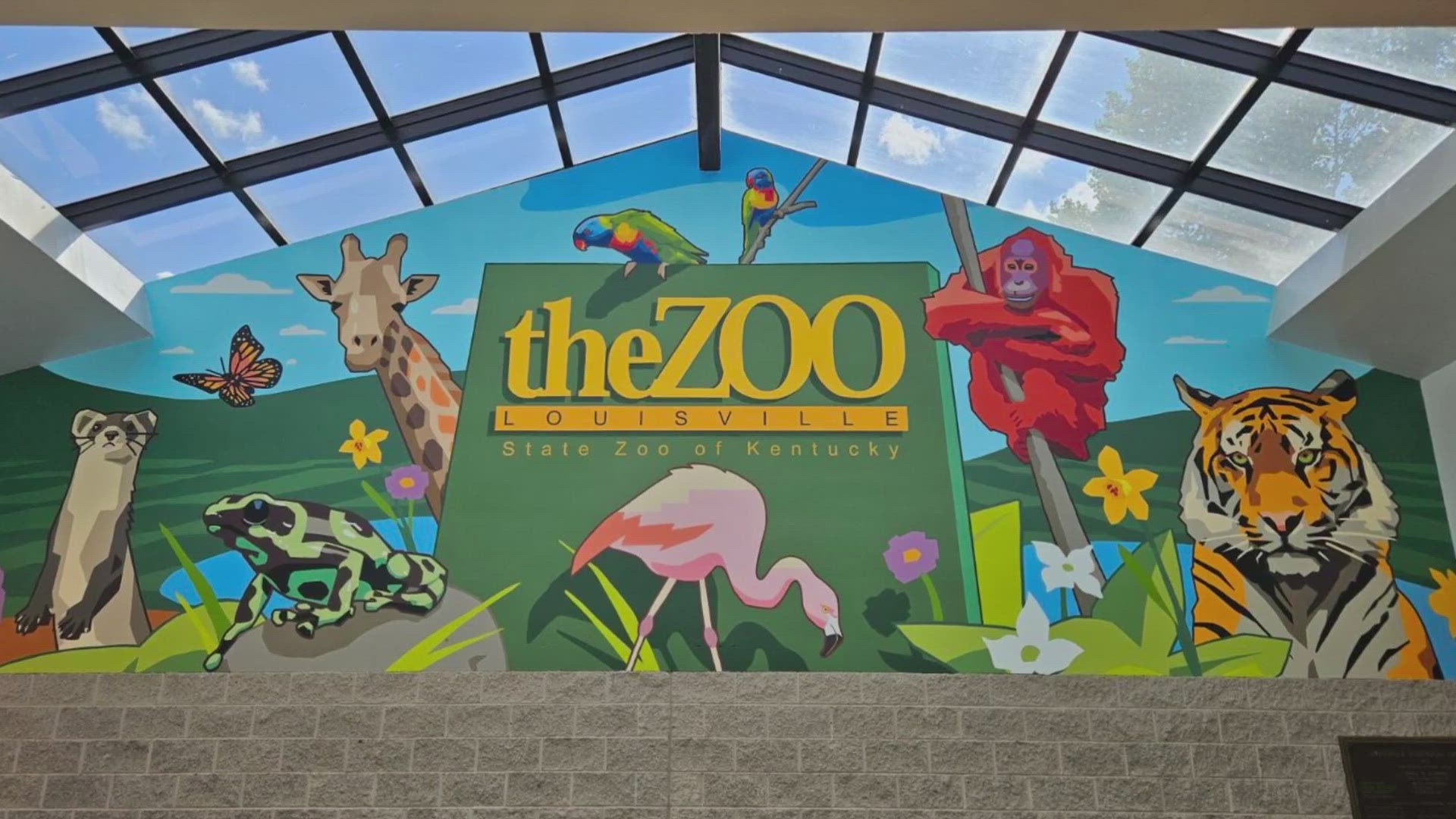 A vibrant new mural has now been added to the Louisville Zoo's entrance.