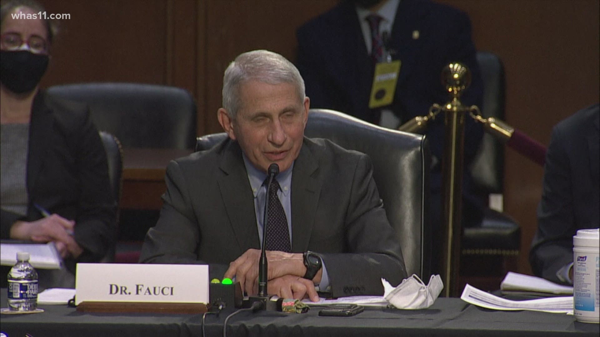 During a Senate hearing, Sen. Rand Paul said Dr. Fauci wearing two masks despite getting the vaccine was 'theater.' Dr. Fauci fired back.