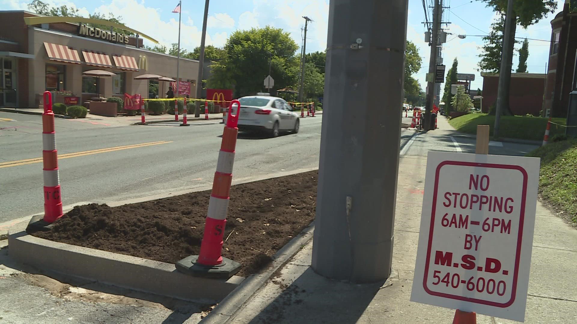 The planters are part of a million-dollar investment to protect walkers, shorten crosswalk distances, slow down drivers and reduce crashes.