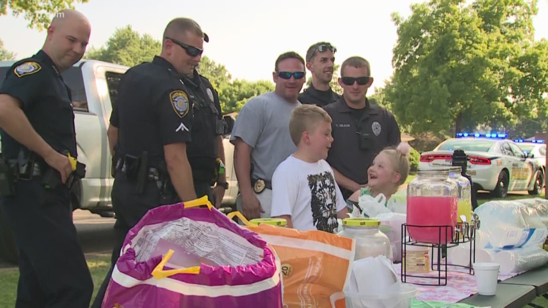 A young Shively boy is taking advantage of the summer weather to raise money for local police.
