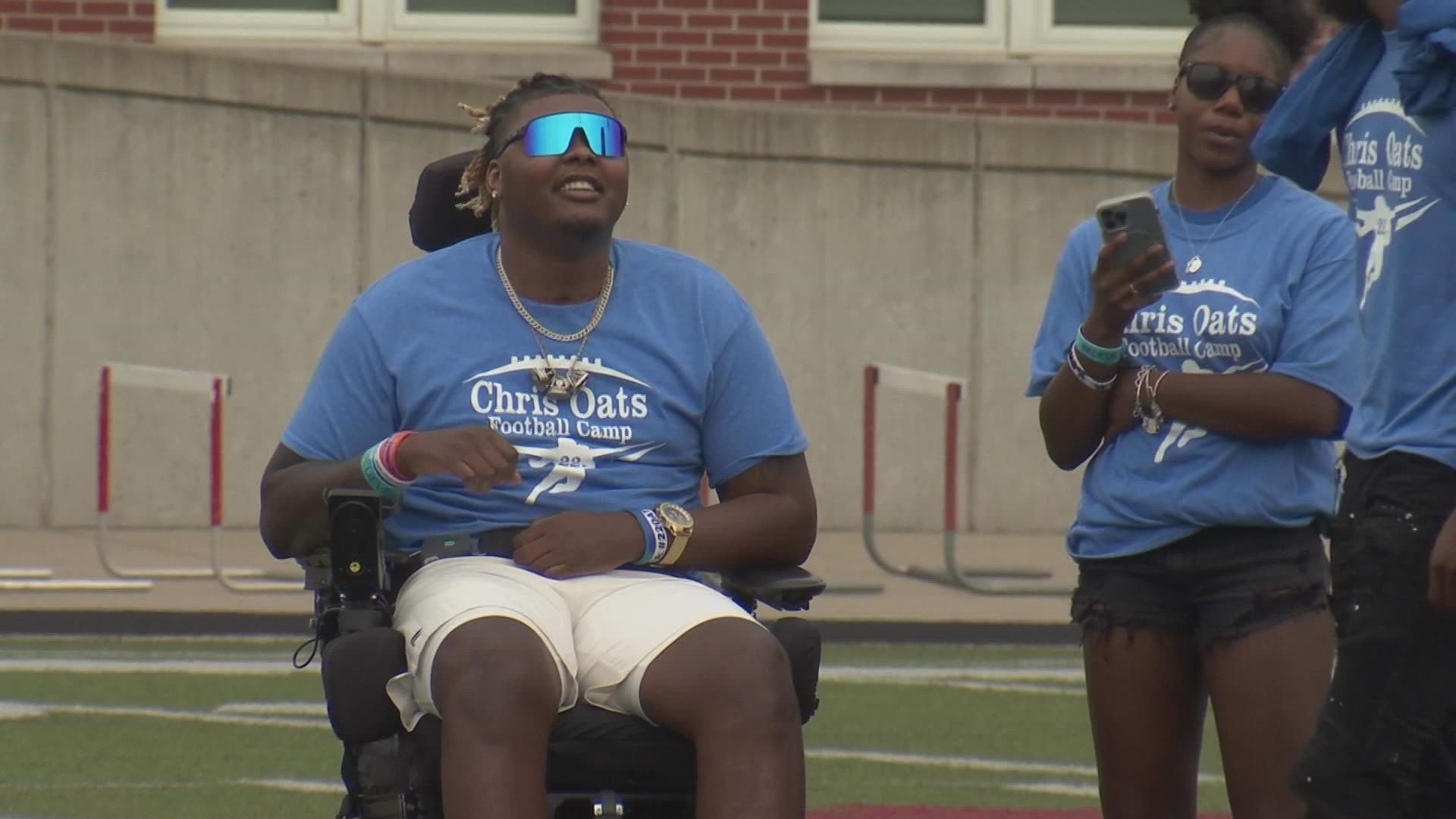 Chris Oates, who suffered a stroke in 2020, continues to give back the community with a special football camp he and current players hosted at Beechwood High.