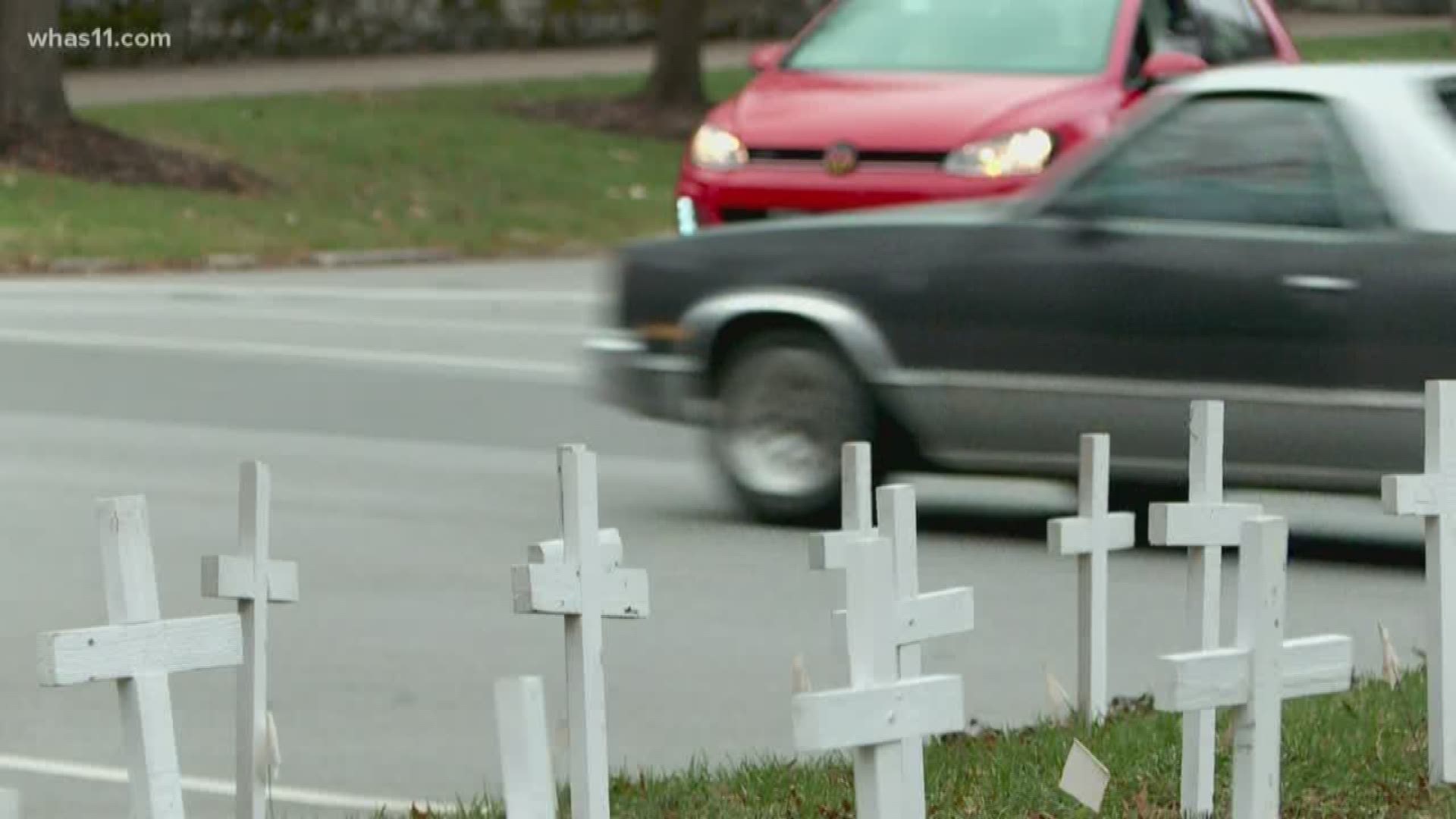 As the year comes to a close, a local church has placed white crosses on their lawn to remember homicide victims.