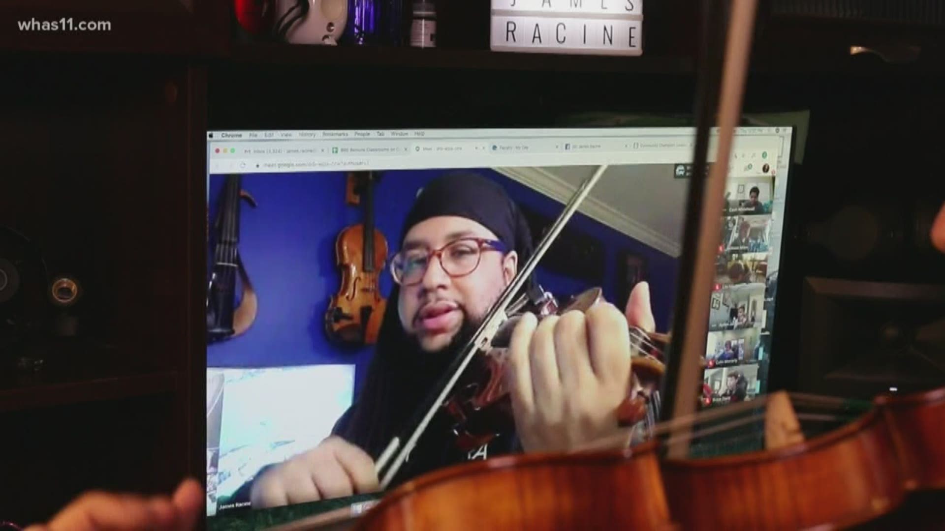 With his string instruments and his computer, James Racine is able to continue his orchestra lessons with his students.