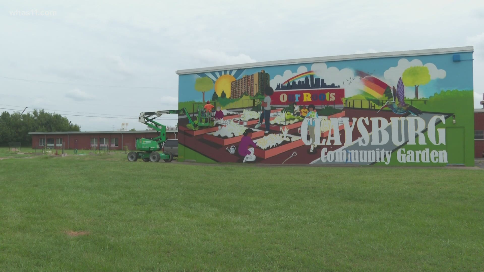 A mural on the side of the old Springhill Elementary School is the first in a series called "Soulful Nourishment."