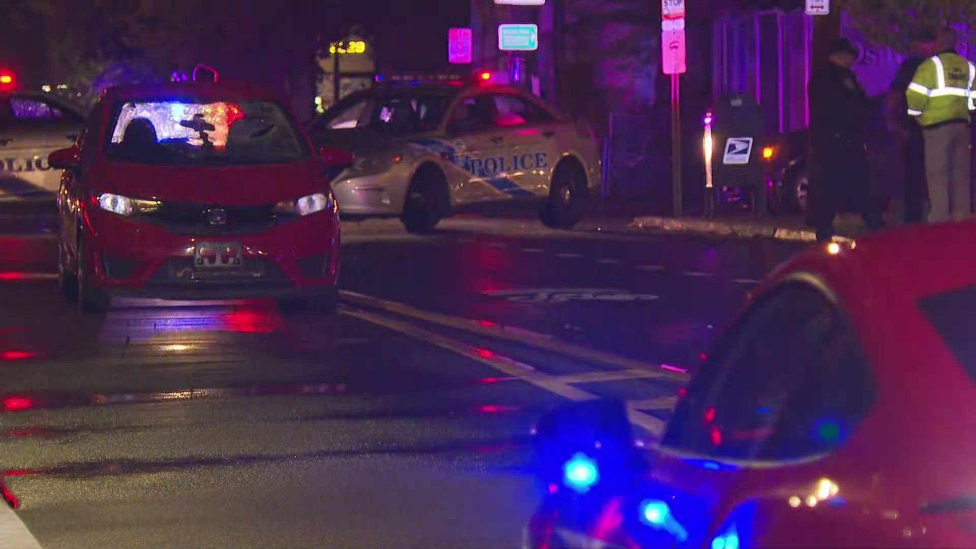 Louisville Metro Police said a car hit two people around 9:30 p.m.