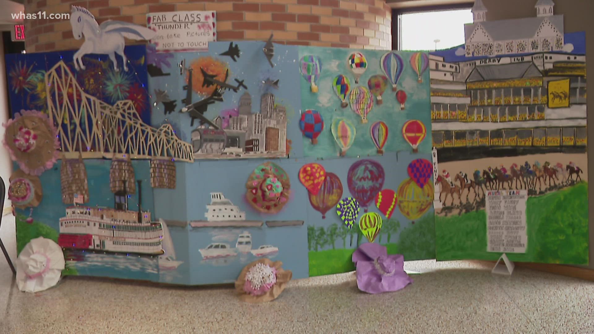 The class painted huge murals of different Kentucky Derby Festival events--from Thunder Over Louisville to the fastest two minutes in sports.