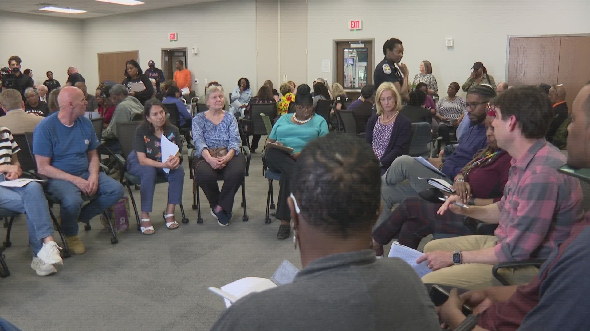 In a public meeting, some attendees pleaded for the DOJ to reconsider not having a member of the community at the table in these discussions.