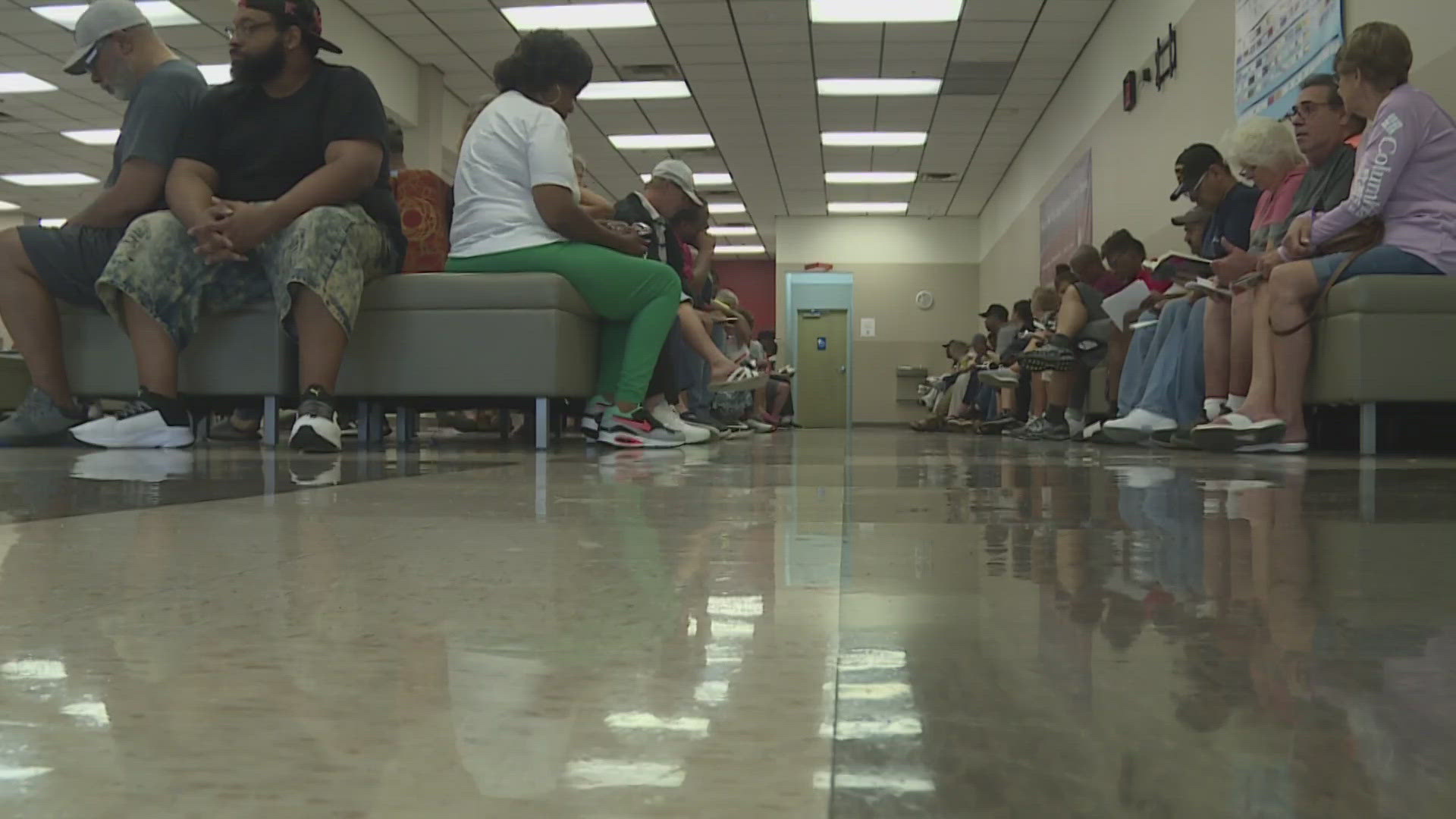 Customers filled every available seat waiting longer than usual to renew their car registration after days of being closed.