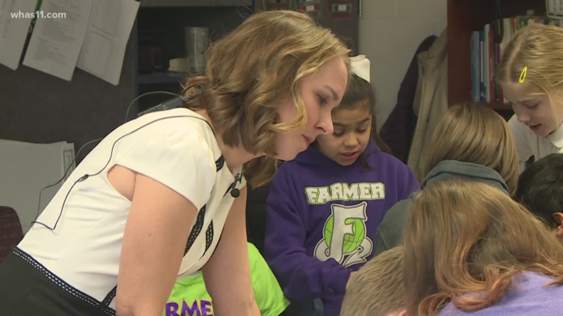 Bethany Collins, a fourth grade teacher at Farmer Elementary, was presented with the ExCEL Award.