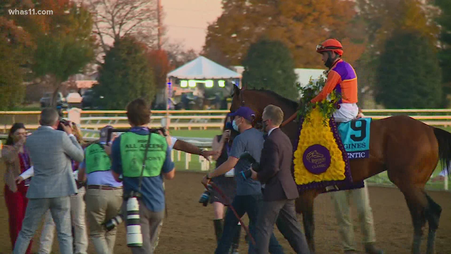 Sports Director Kent Spencer talks to trainer Bob Baffert after Authentic captures the Breeders' Cup.