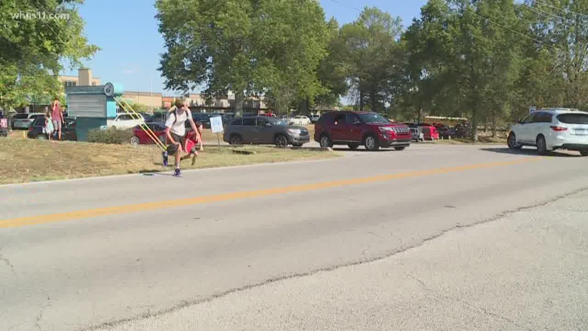 Oldham county parents express their discontent of having no crosswalk across busy street across from middle school.