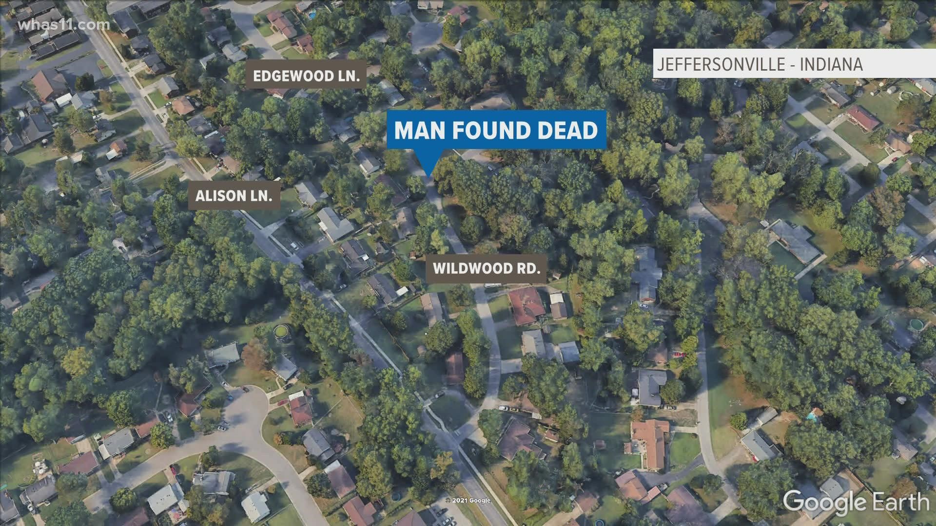 Police in Jeffersonville say a man is in custody after a Wisconsin man was found dead in a local neighborhood.