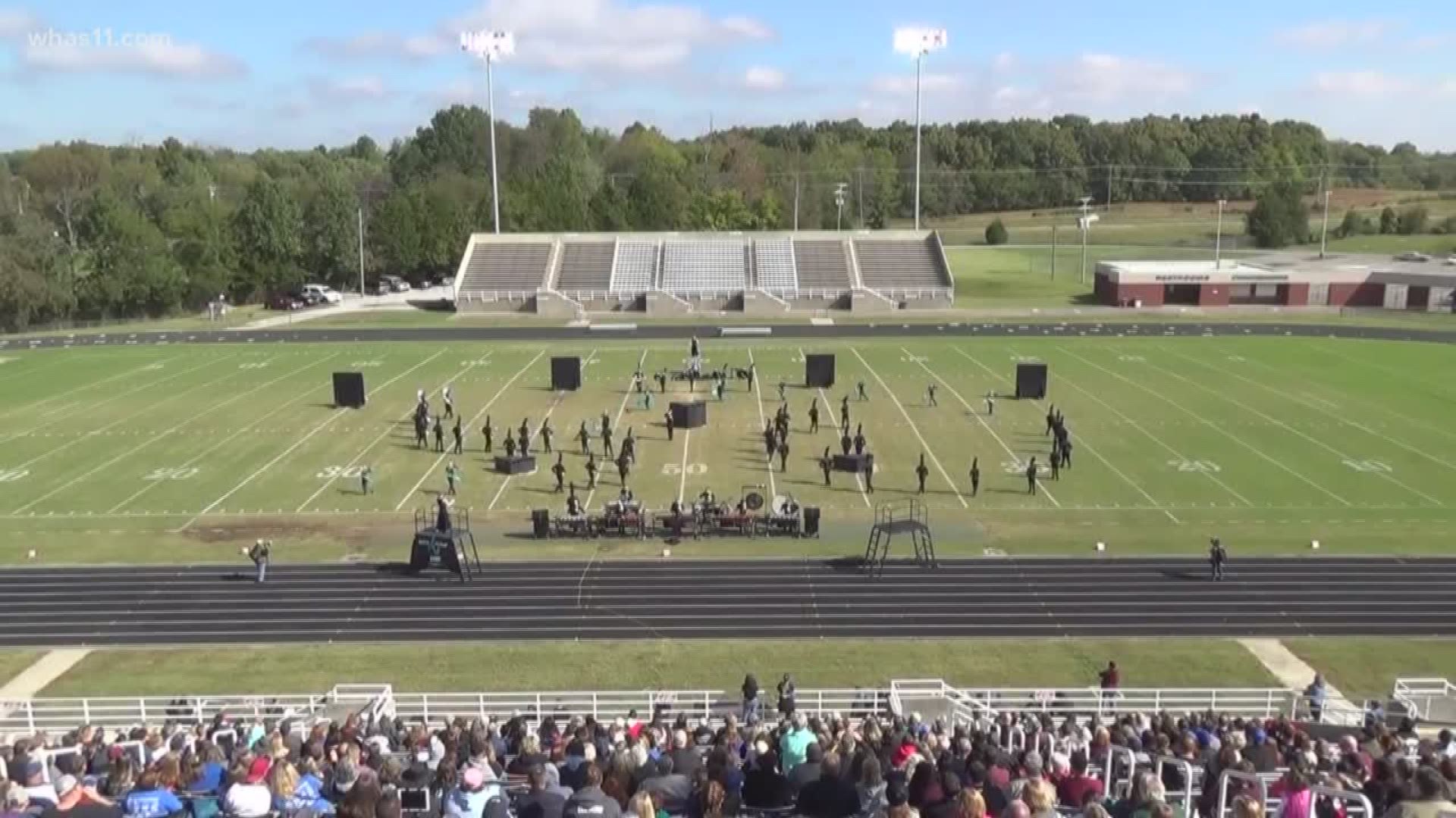 The marching band at North Oldham High is hoping to make a difference with their inspiring performance, paying tribute to the band director's son