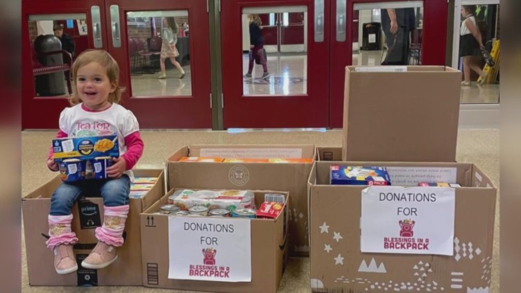 Little girl, family donates food to Blessings in a Backpack