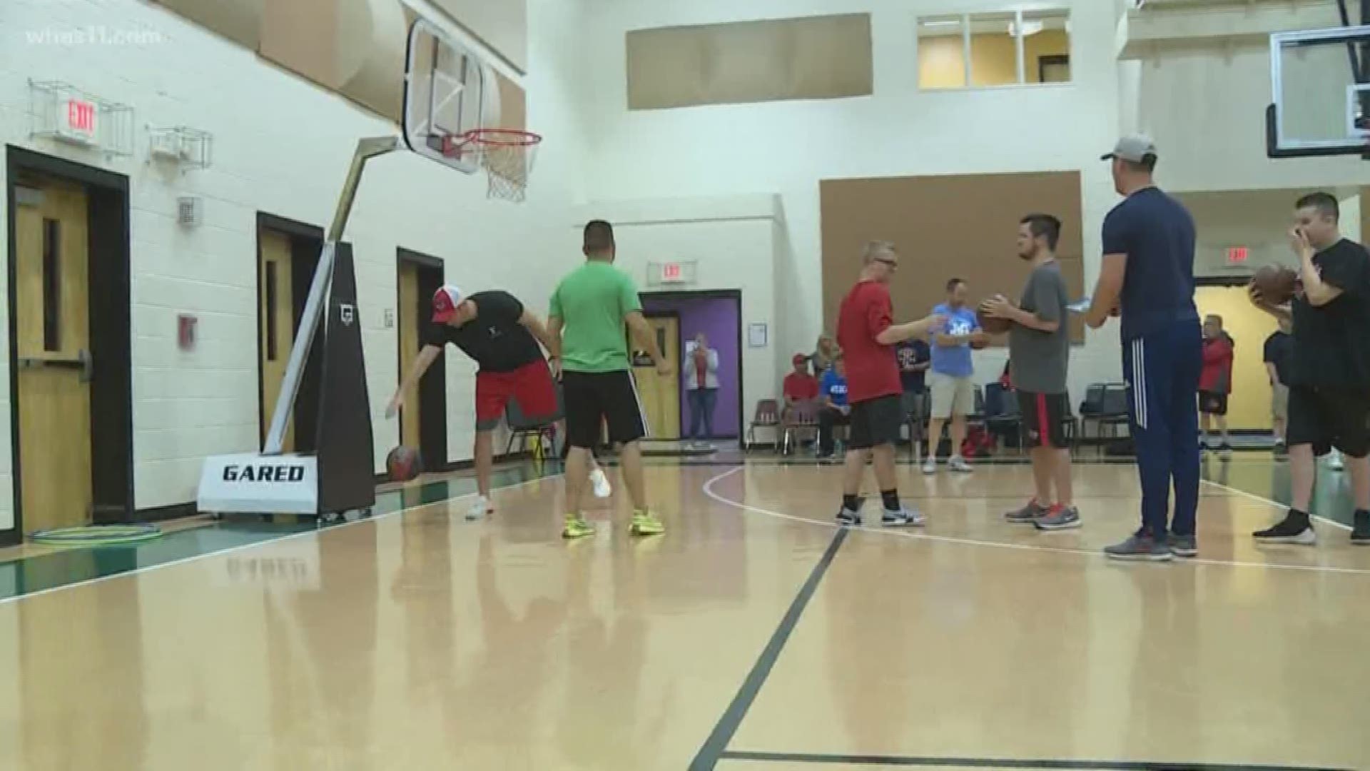 For some families, a summer basketball clinic is somewhat of the norm, but as former Louisville Cardinal Luke Hancock shows, us, for other families, a simple game of basketball can be life changing.