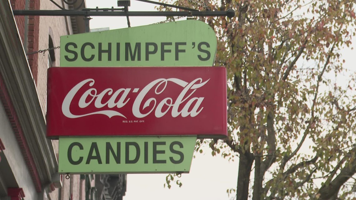Patrons watch as Schimpff's Confectionary makes signature holiday candy