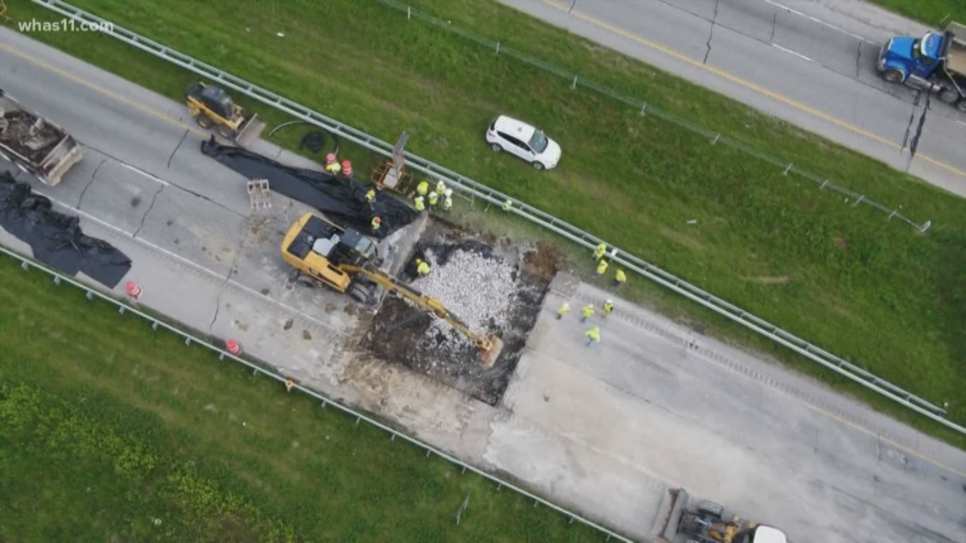 After a sinkhole closed down part of the highway, backed up traffic caused an accident on I-265 near New Albany that killed two people.